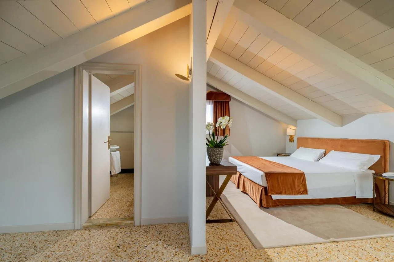 Bed in Hotel Tiziano