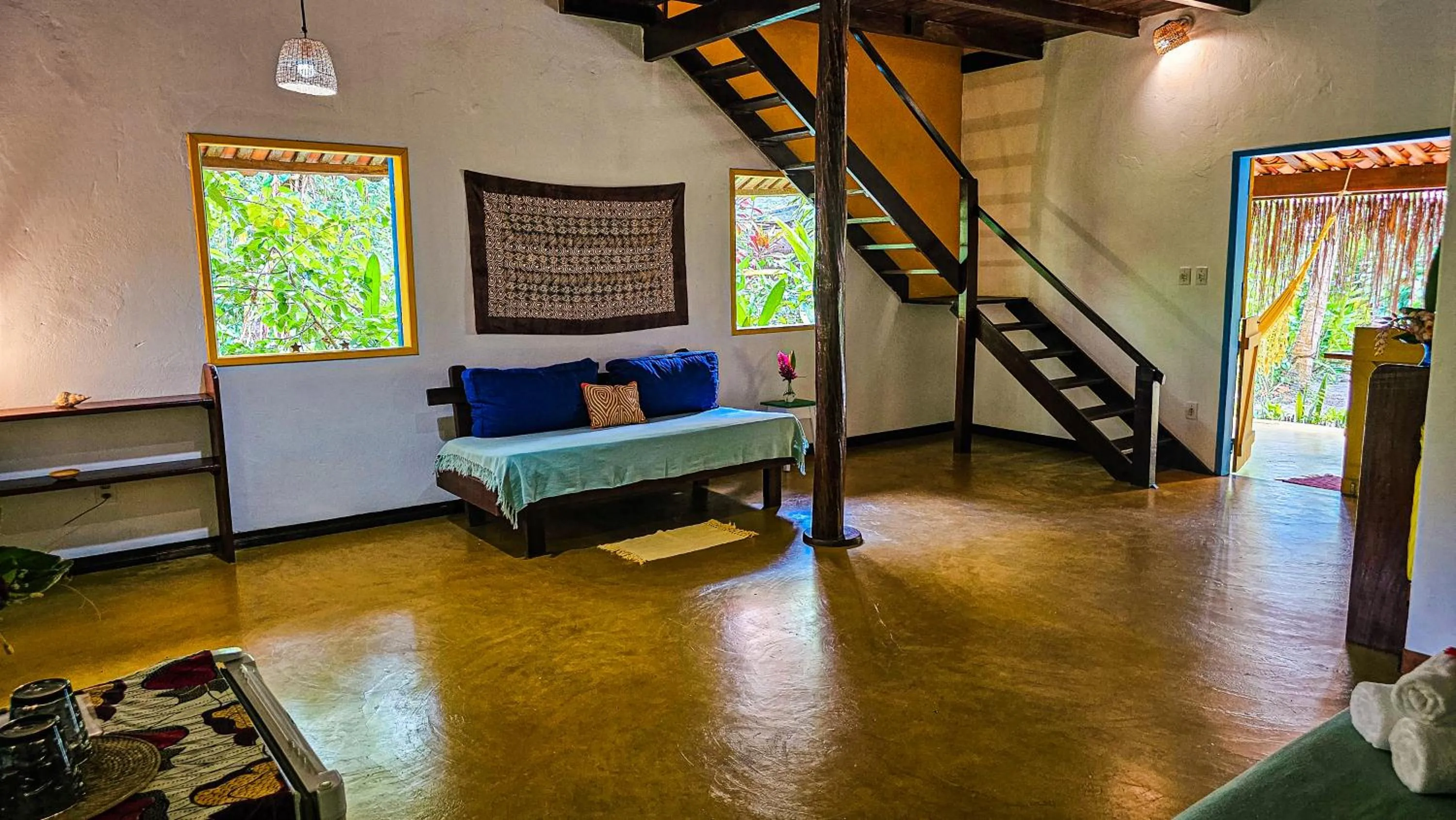 Living room, Bed in Pousada Canoa Nativa