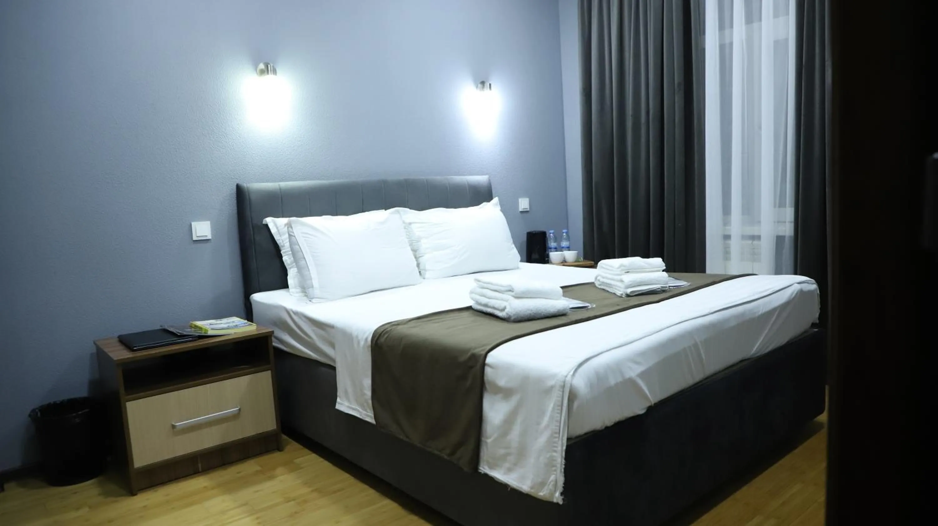 Bed in Grand Avenue Hotel