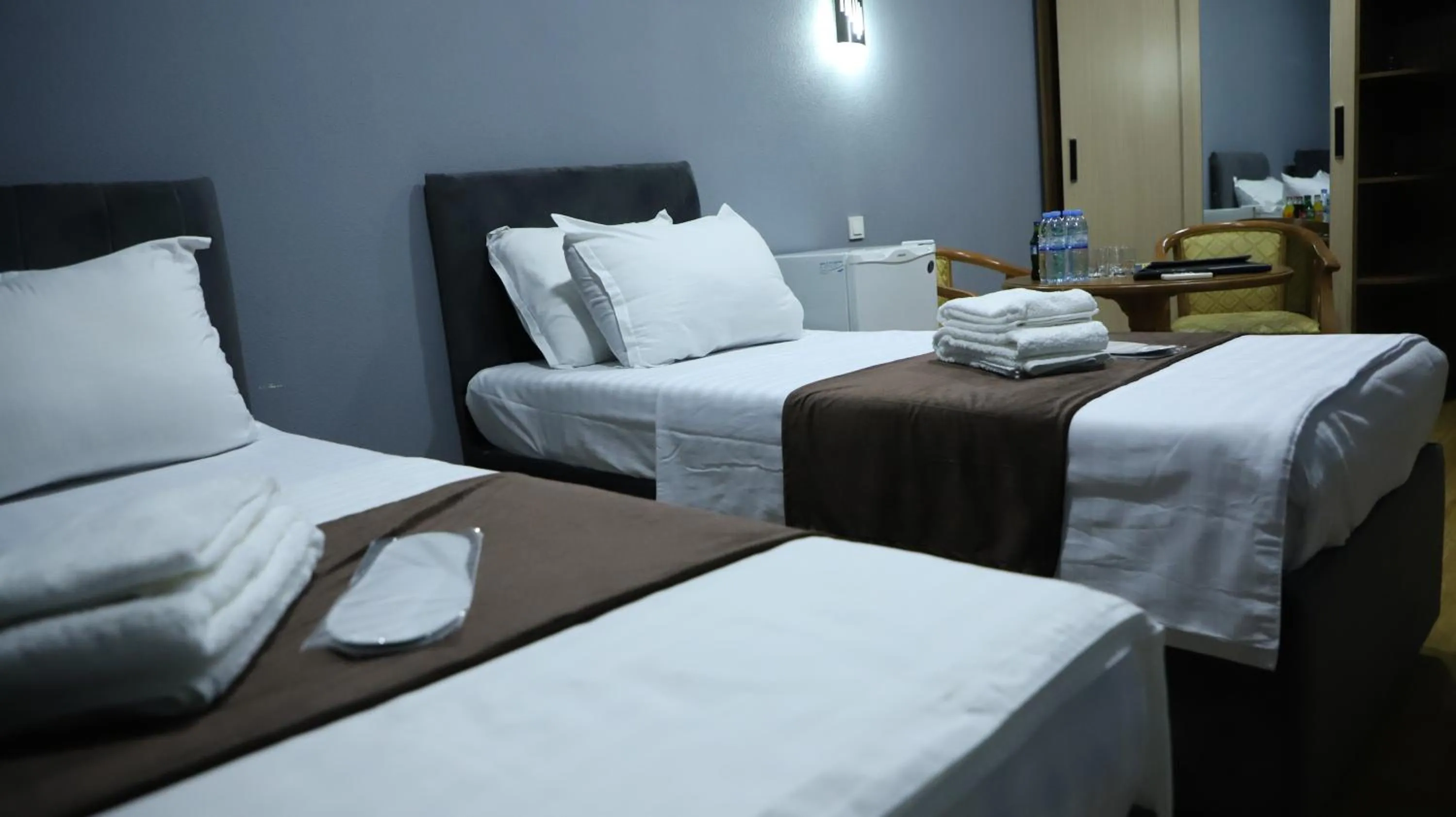 Bed in Grand Avenue Hotel