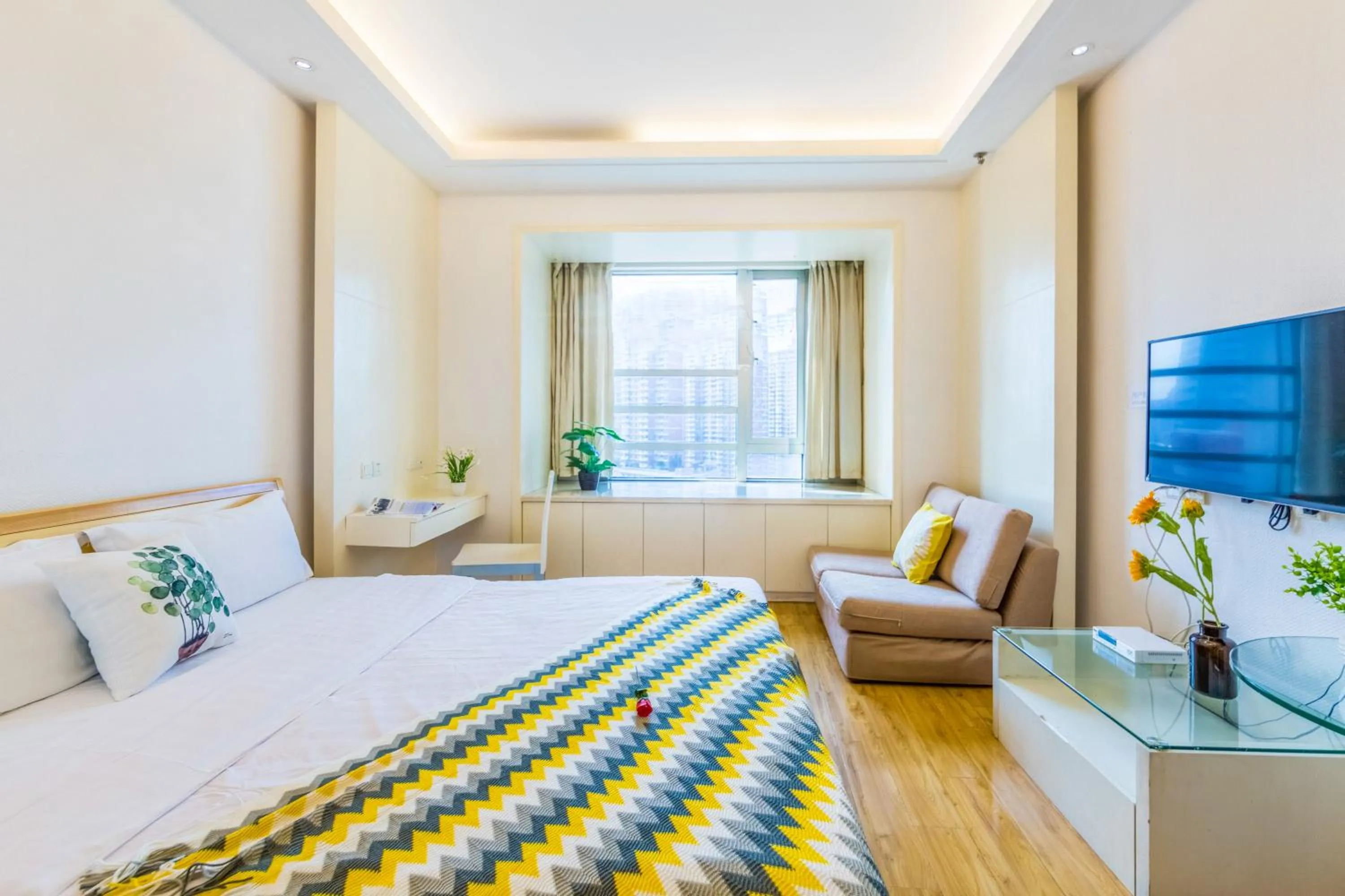 Bed in Shanghai Jiarong Hotel Apartment