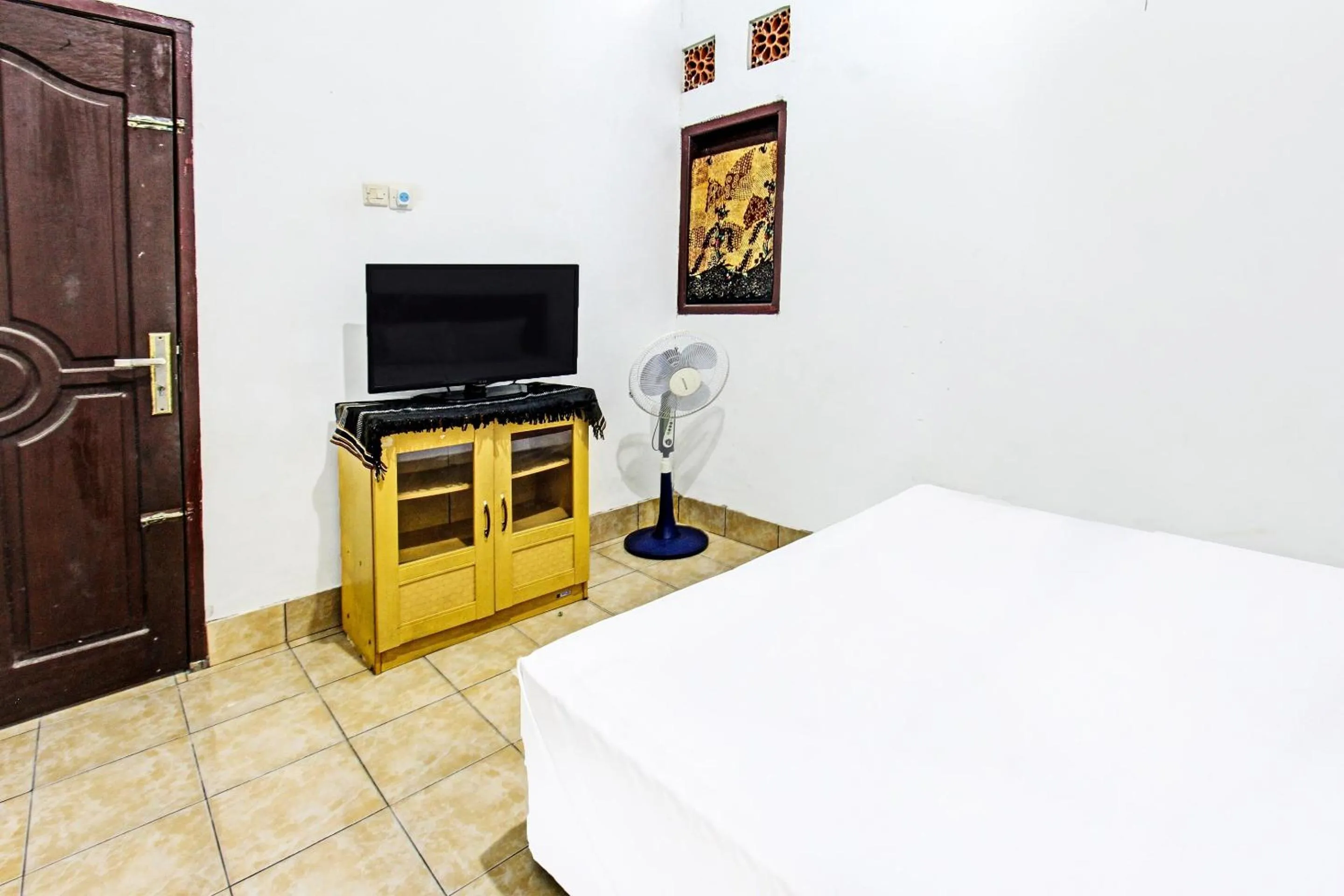 Bedroom in Hotel O Dani HomestayNearSesaot Lodge