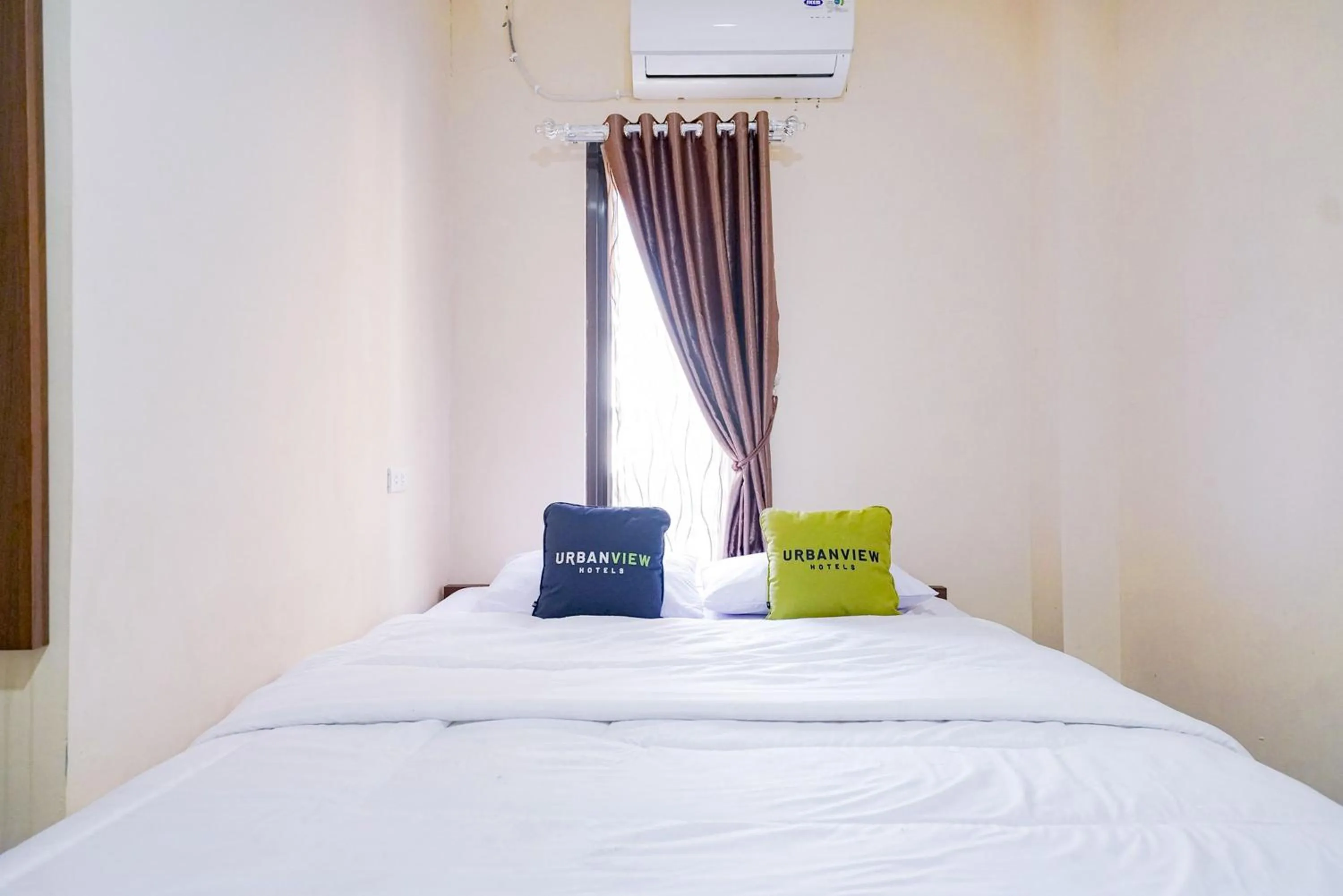 Bedroom, Bed in Urbanview Hotel St Faustina Lampung by RedDoorz