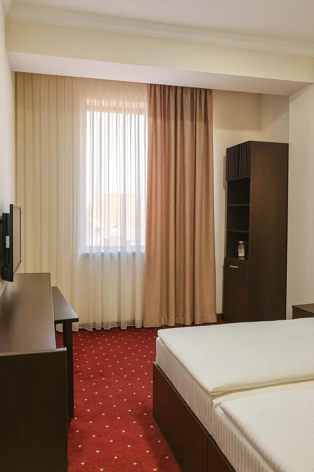 Bed in Anga Yerevan Hotel