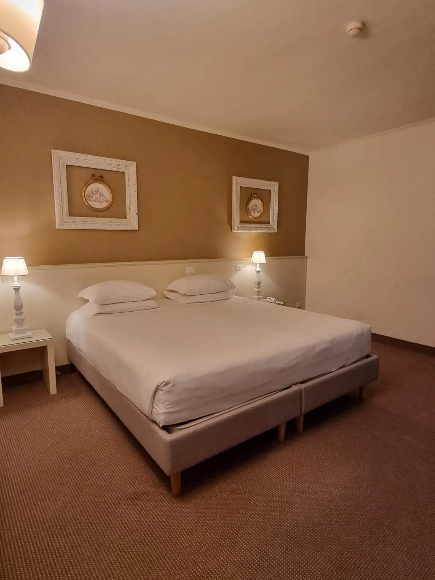 Bed in Hotel Canon d'Oro