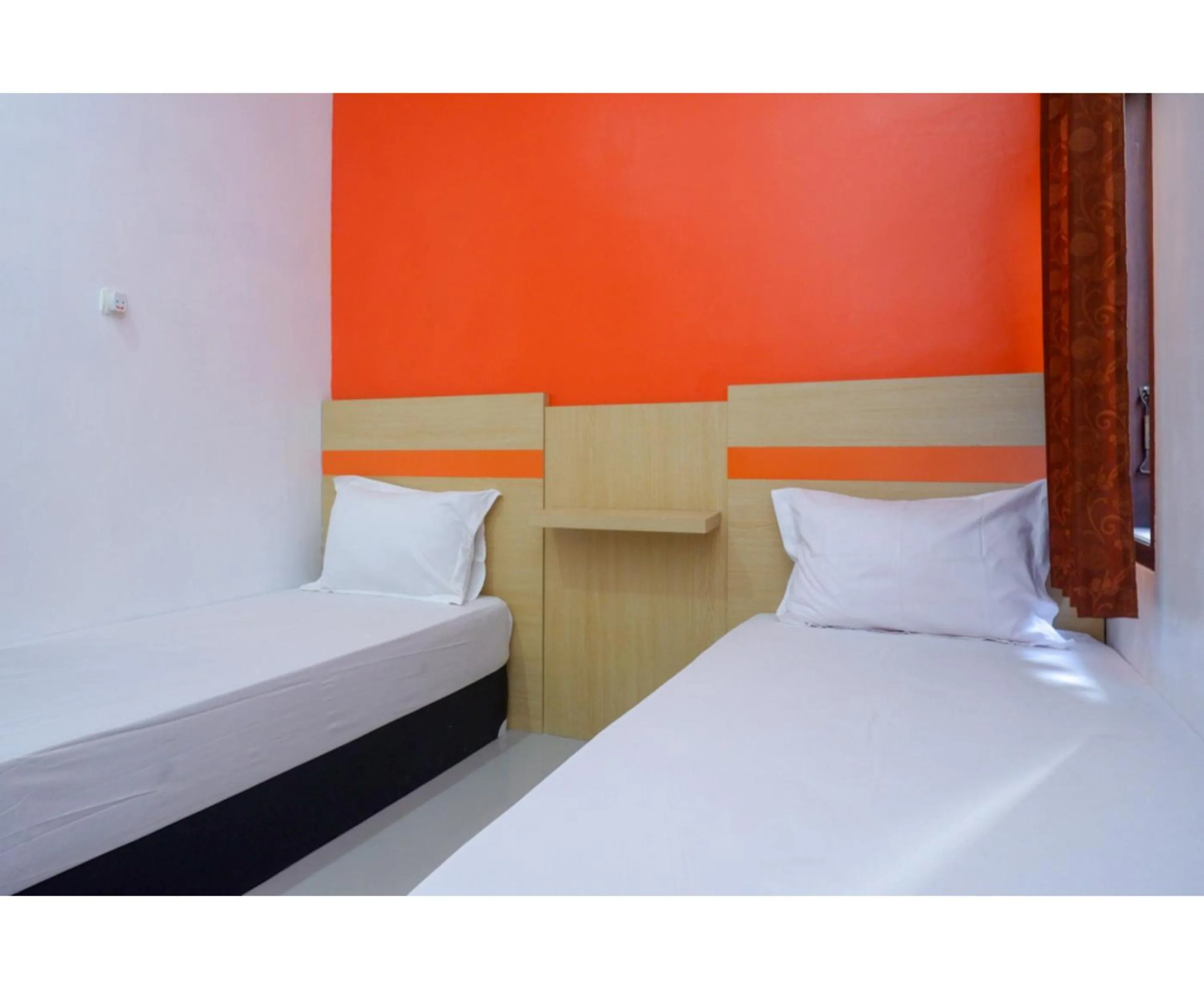 Bed in RedDoorz Syariah near Alun Alun Kota Rembang