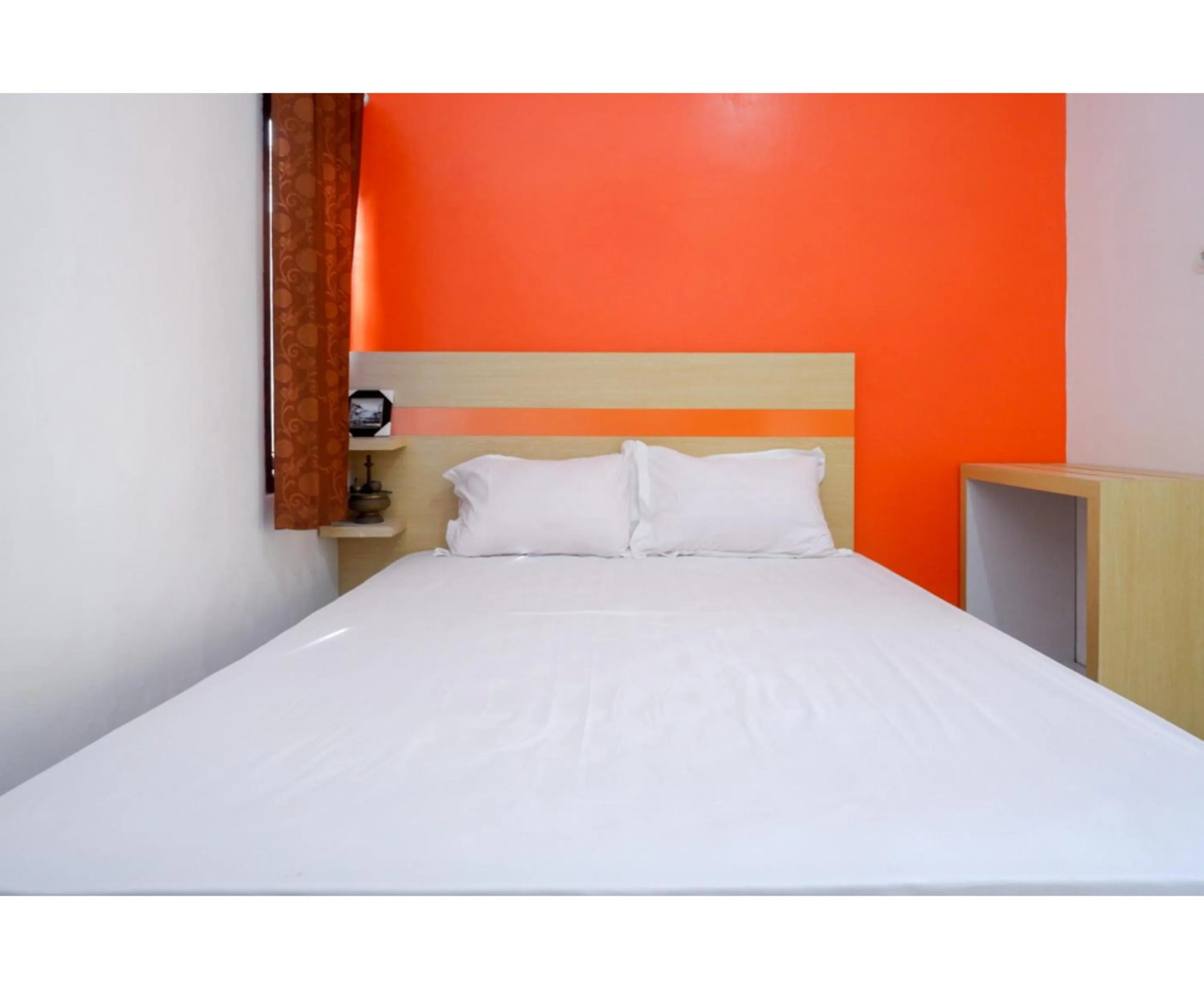 Bed in RedDoorz Syariah near Alun Alun Kota Rembang