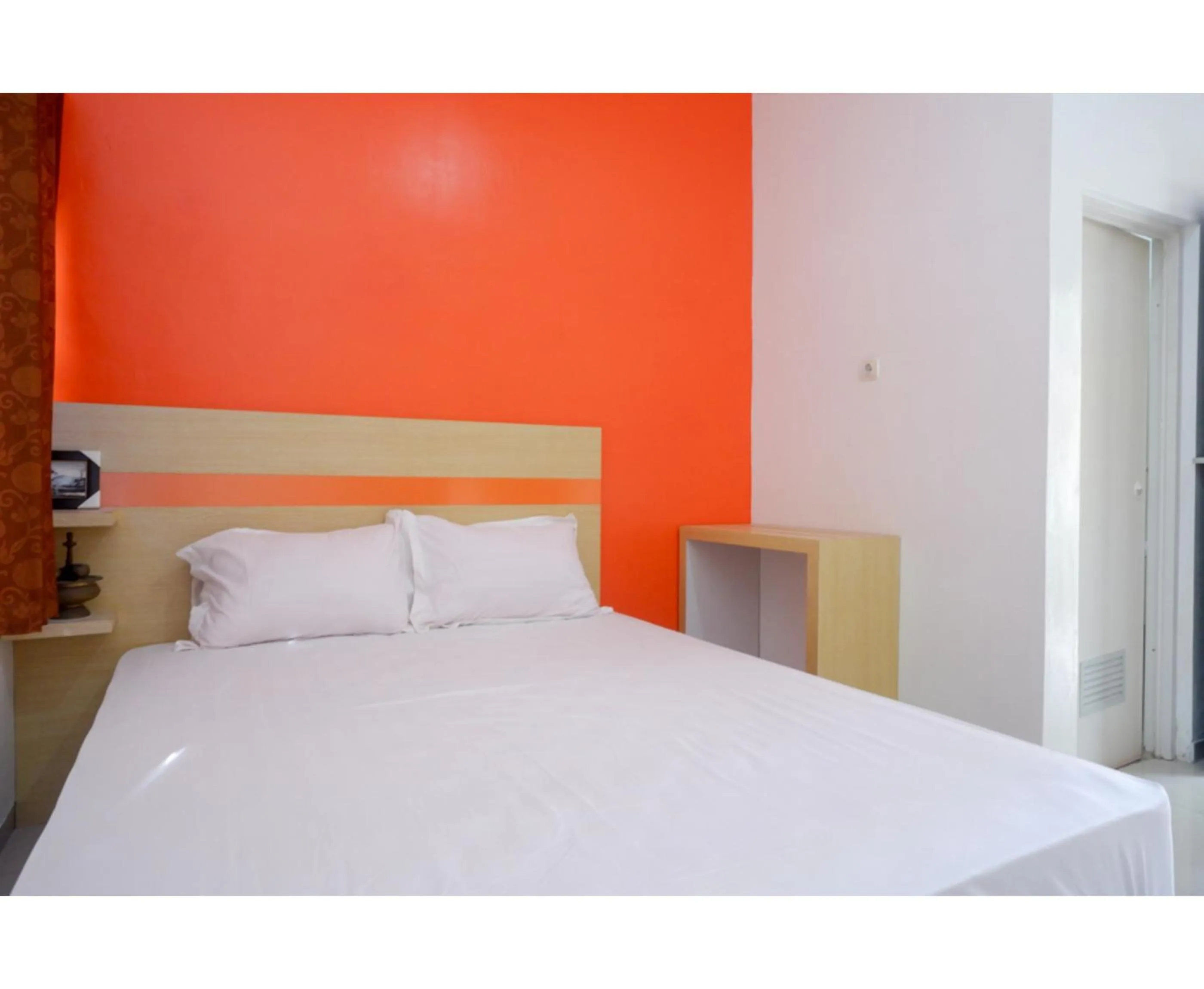 Bed in RedDoorz Syariah near Alun Alun Kota Rembang