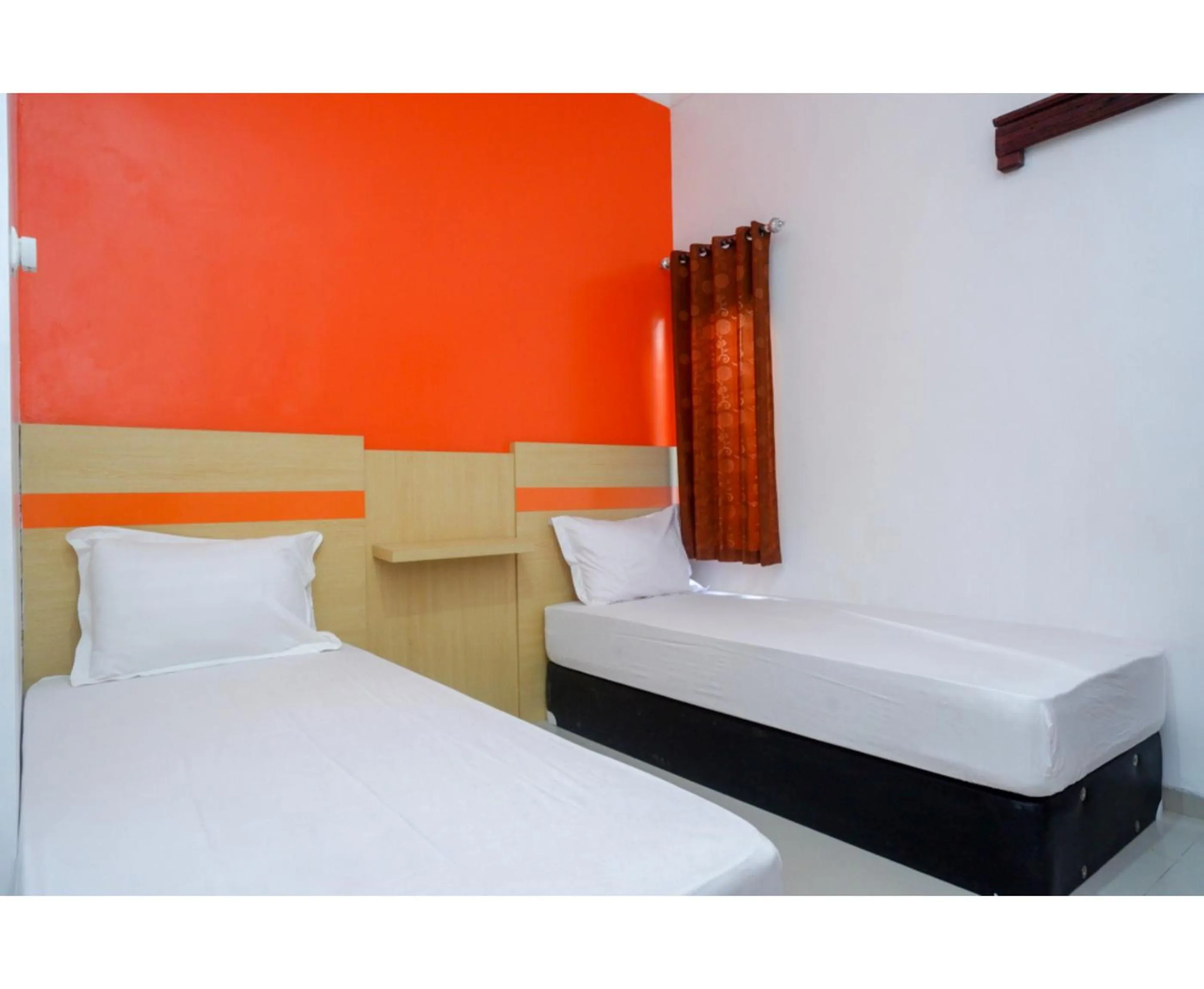 Bed in RedDoorz Syariah near Alun Alun Kota Rembang