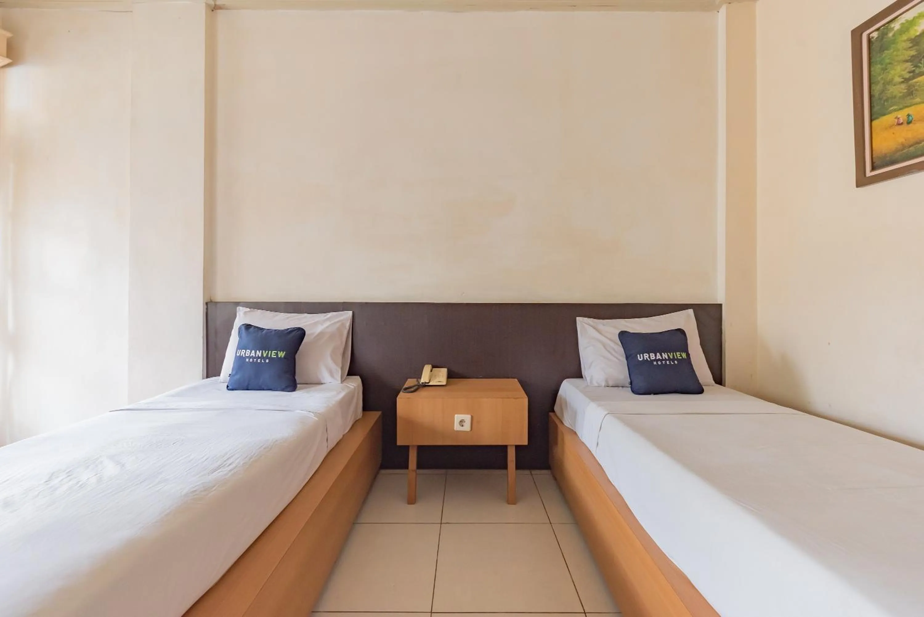 Bedroom, Bed in Urbanview Hotel Crown Tasikmalaya by RedDoorz