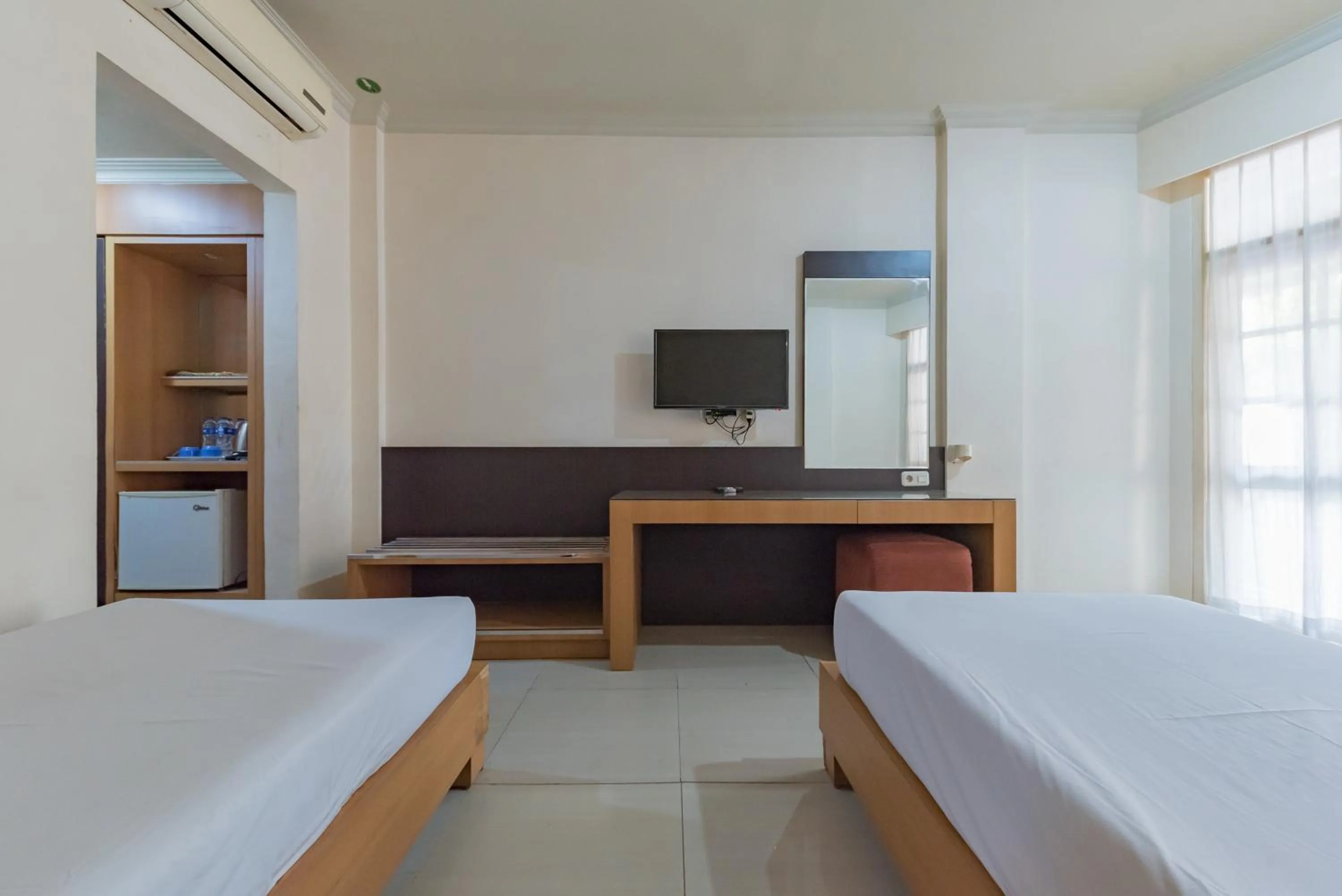 Bedroom, Bed in Urbanview Hotel Crown Tasikmalaya by RedDoorz