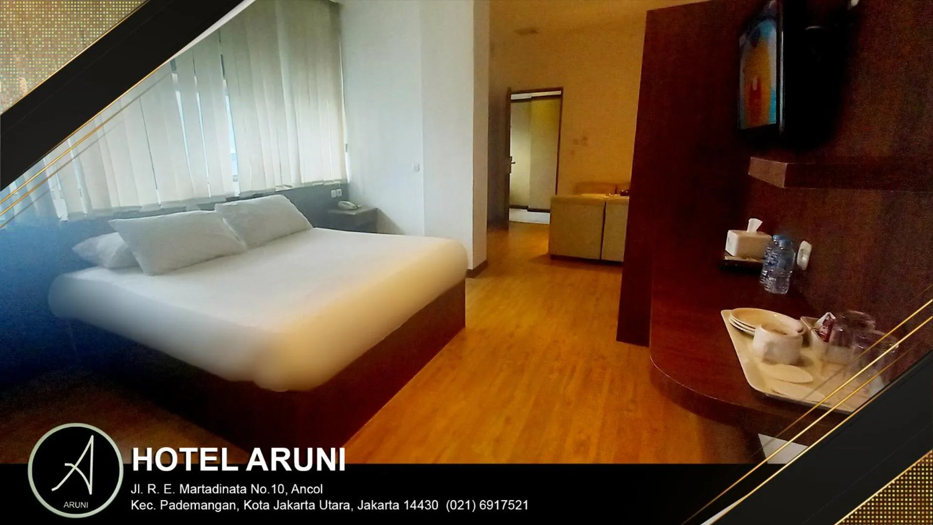 TV and multimedia, Bed in Hotel Aruni Ancol