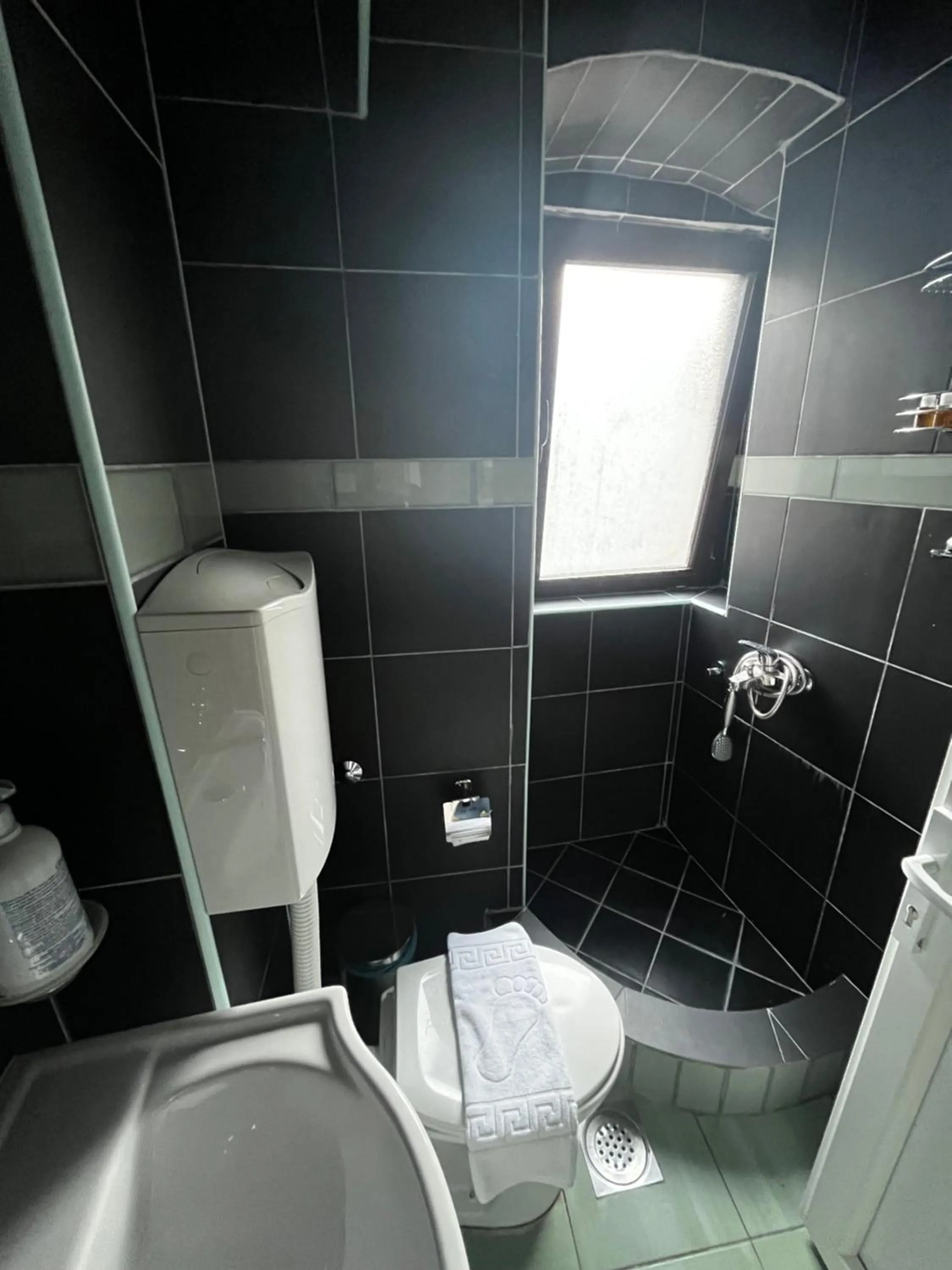 Bathroom in Puerta Apartments