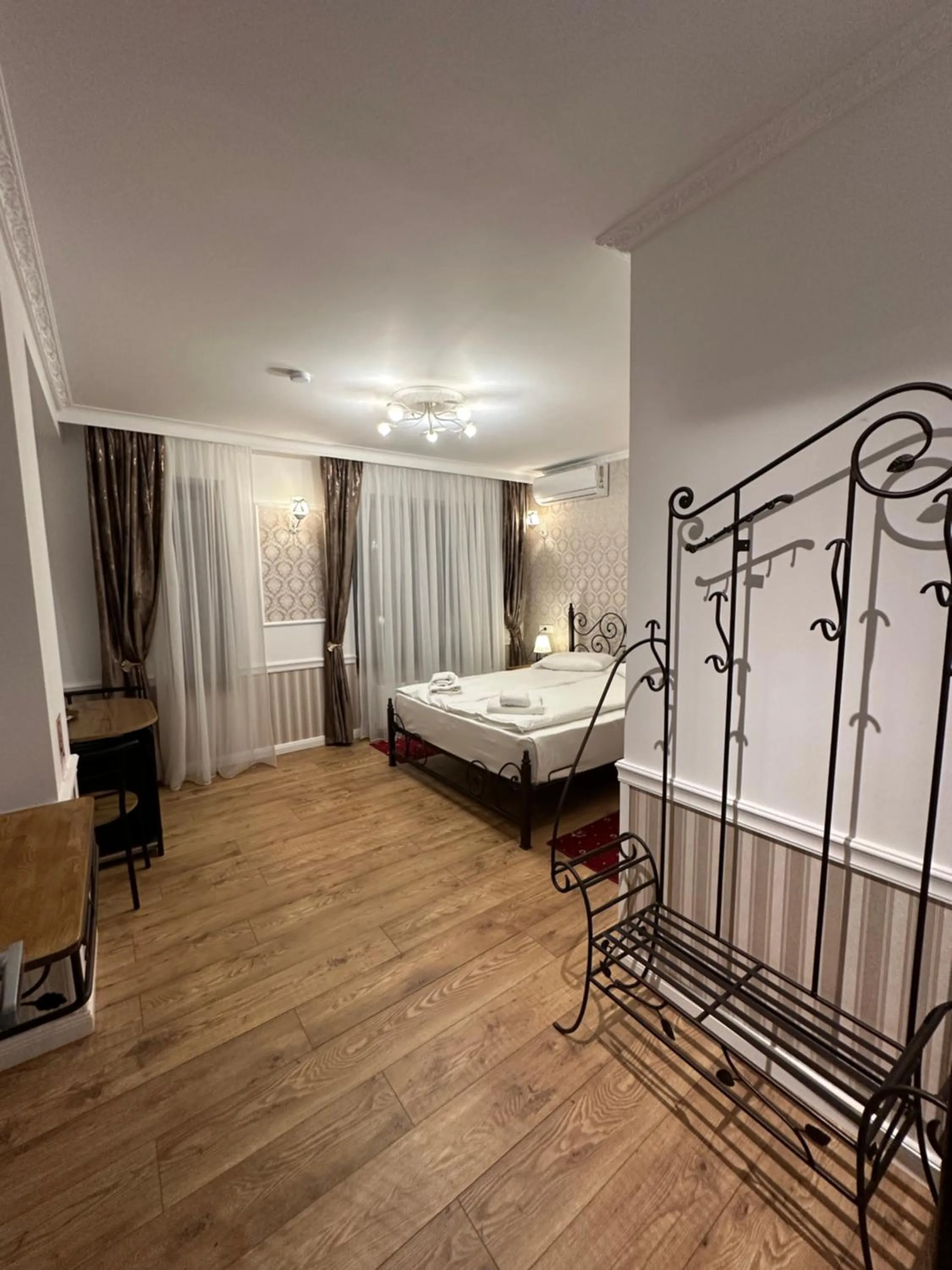 Bed in Hotel Boutique Cathedral Plaza Residences room for rent downtown