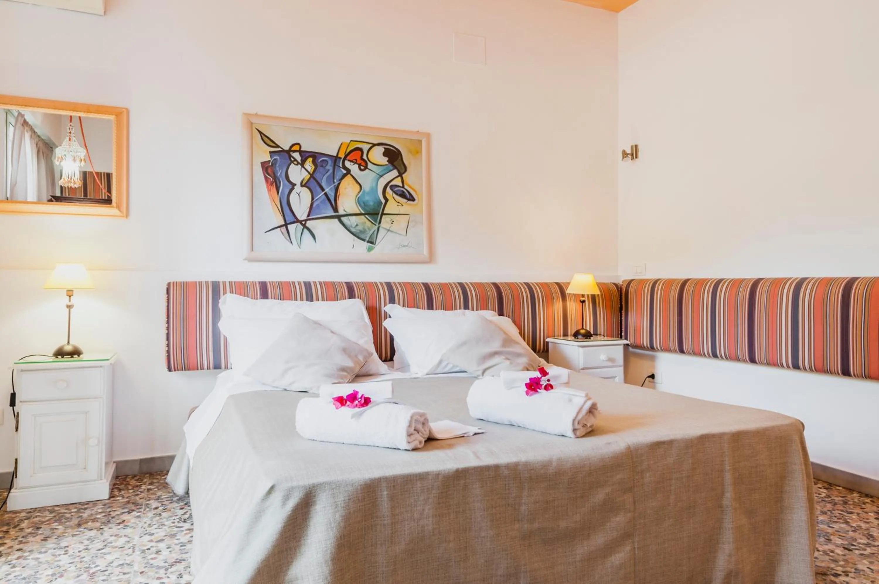 Bed in Stella del mare Apartments