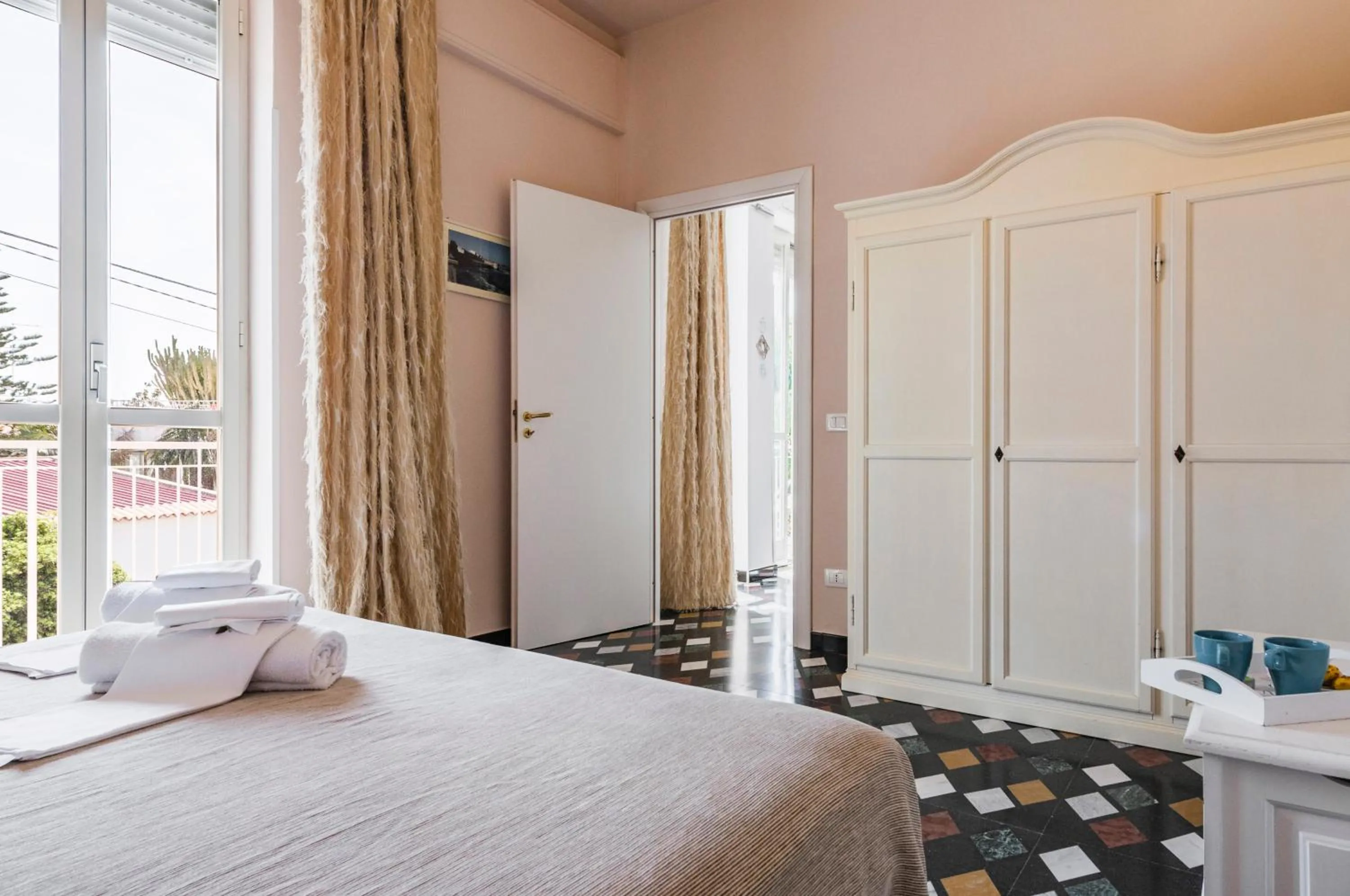 Bed in Stella del mare Apartments