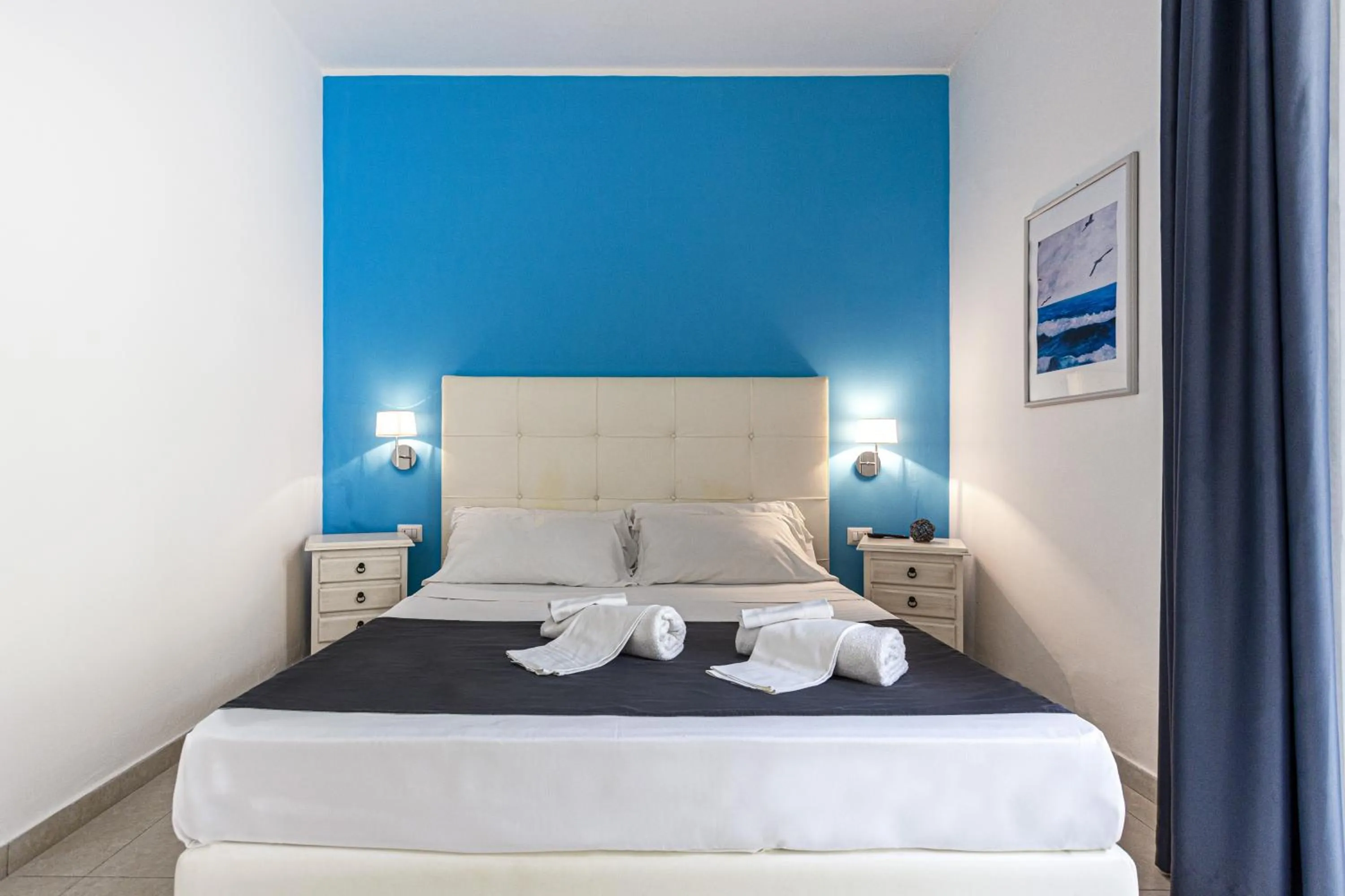 Bed in Stella del mare Apartments