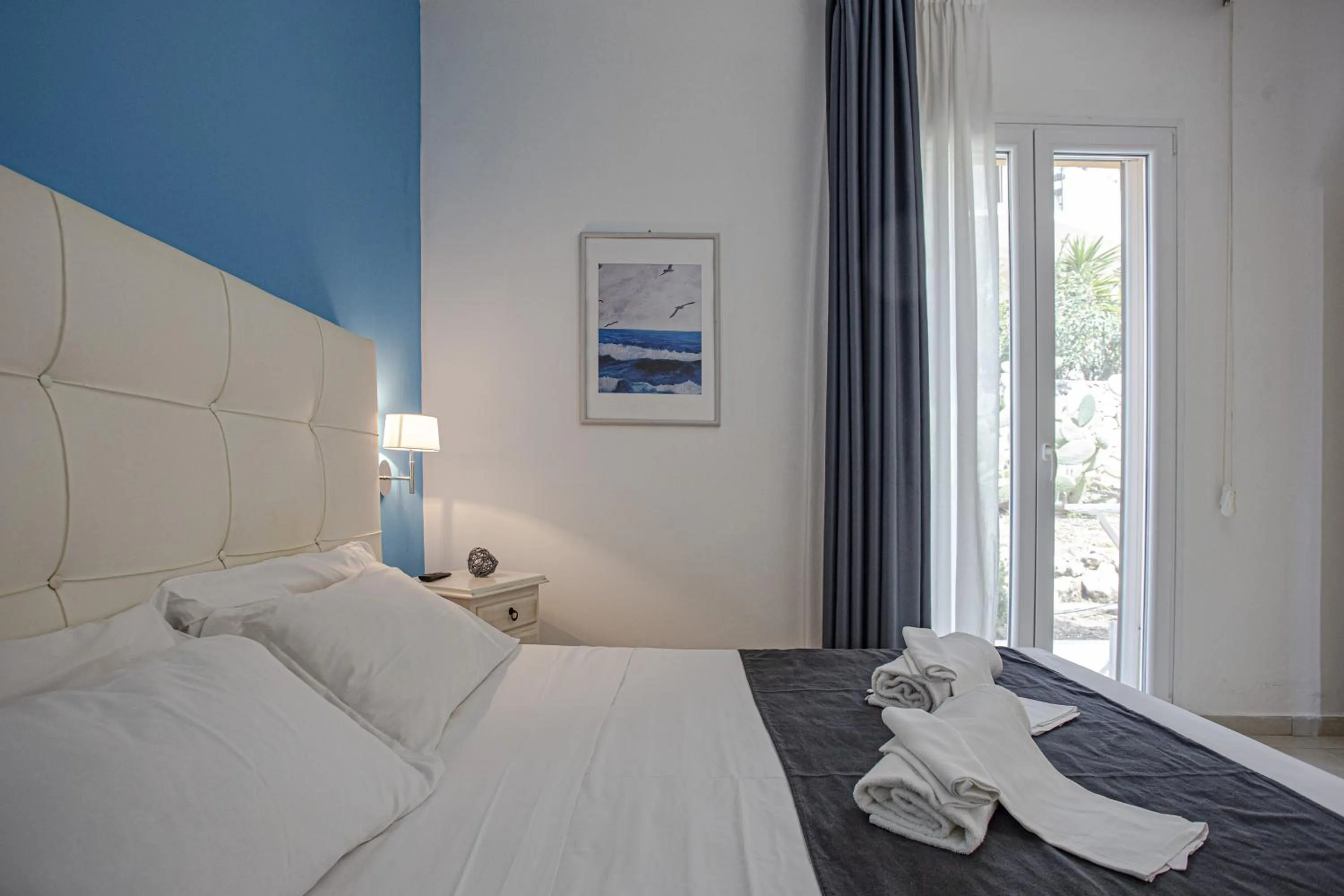 Bed in Stella del mare Apartments