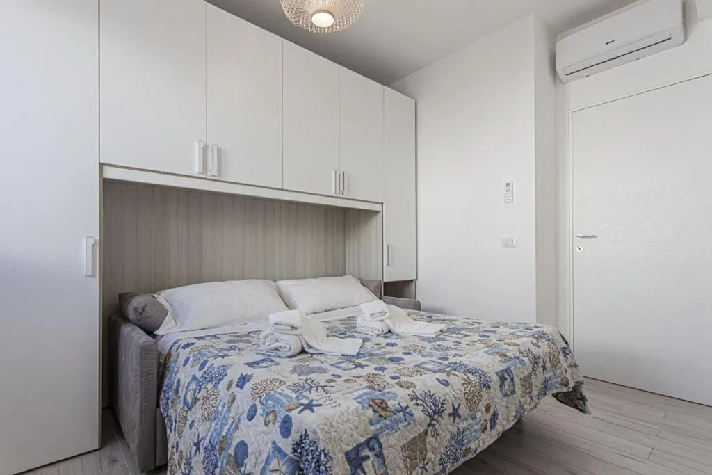 Bed in Stella del mare Apartments