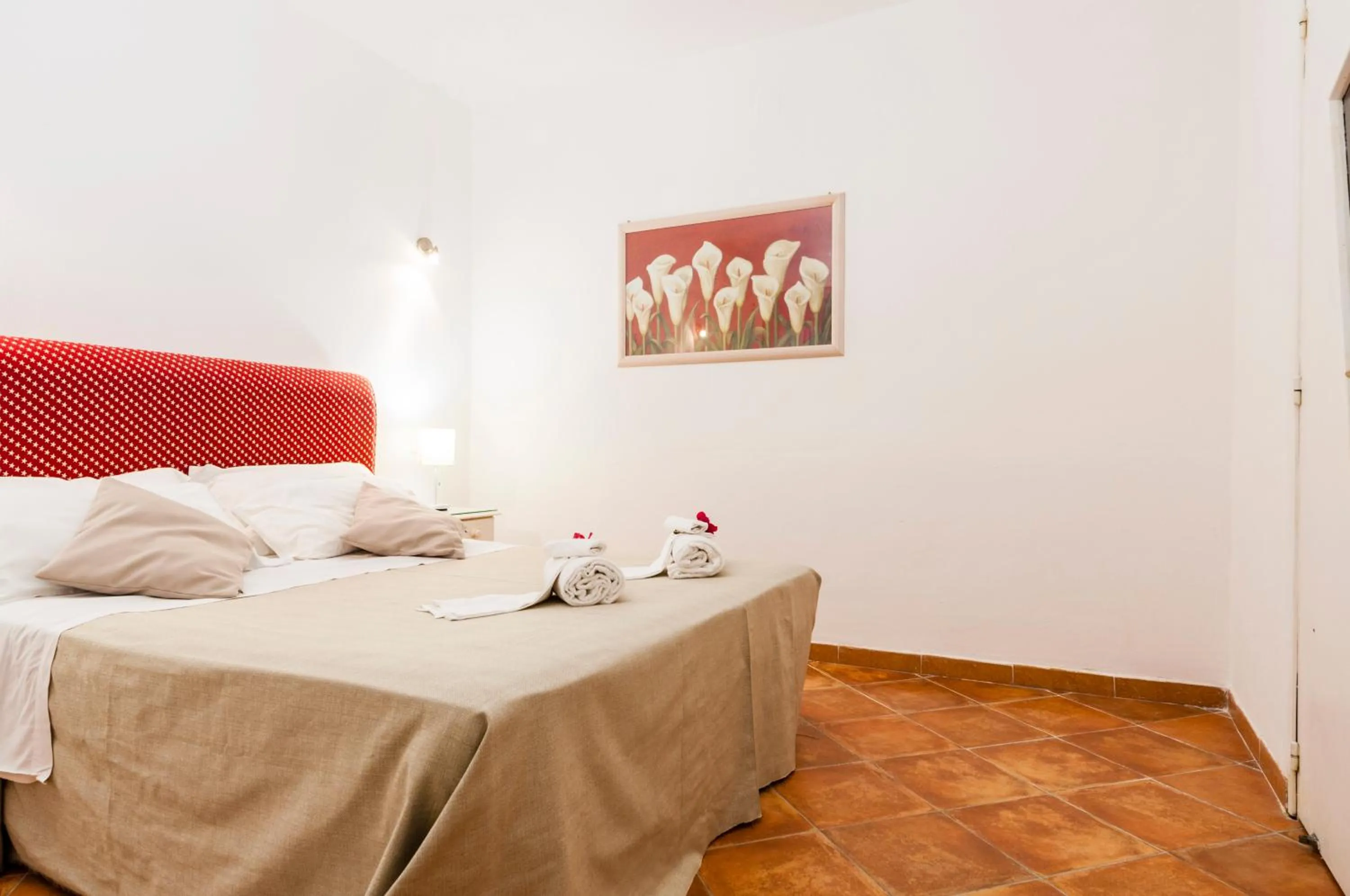 Bed in Stella del mare Apartments