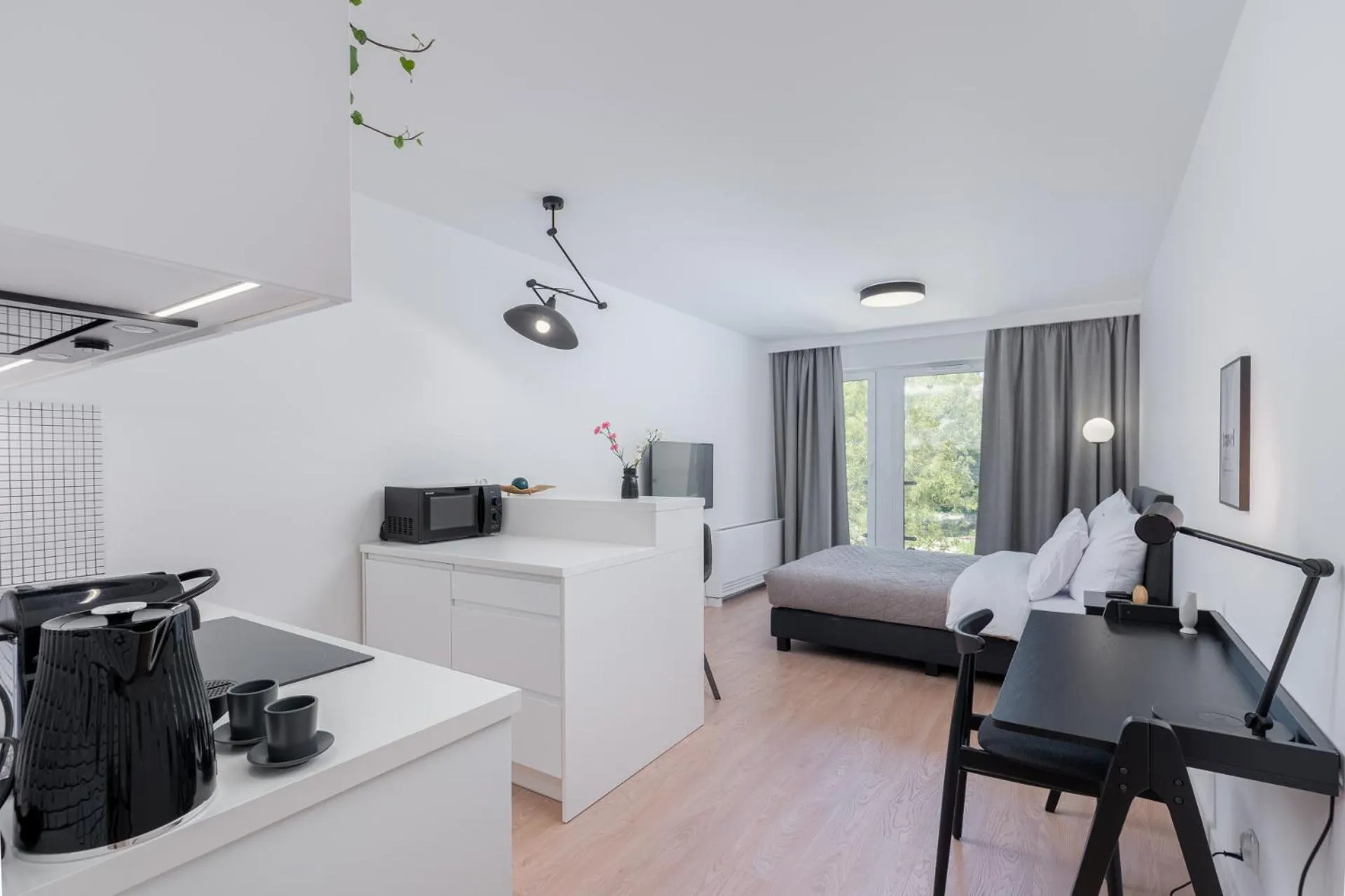 Photo of the whole room in EXCLUSIVE Aparthotel Kraków Lubicz 40