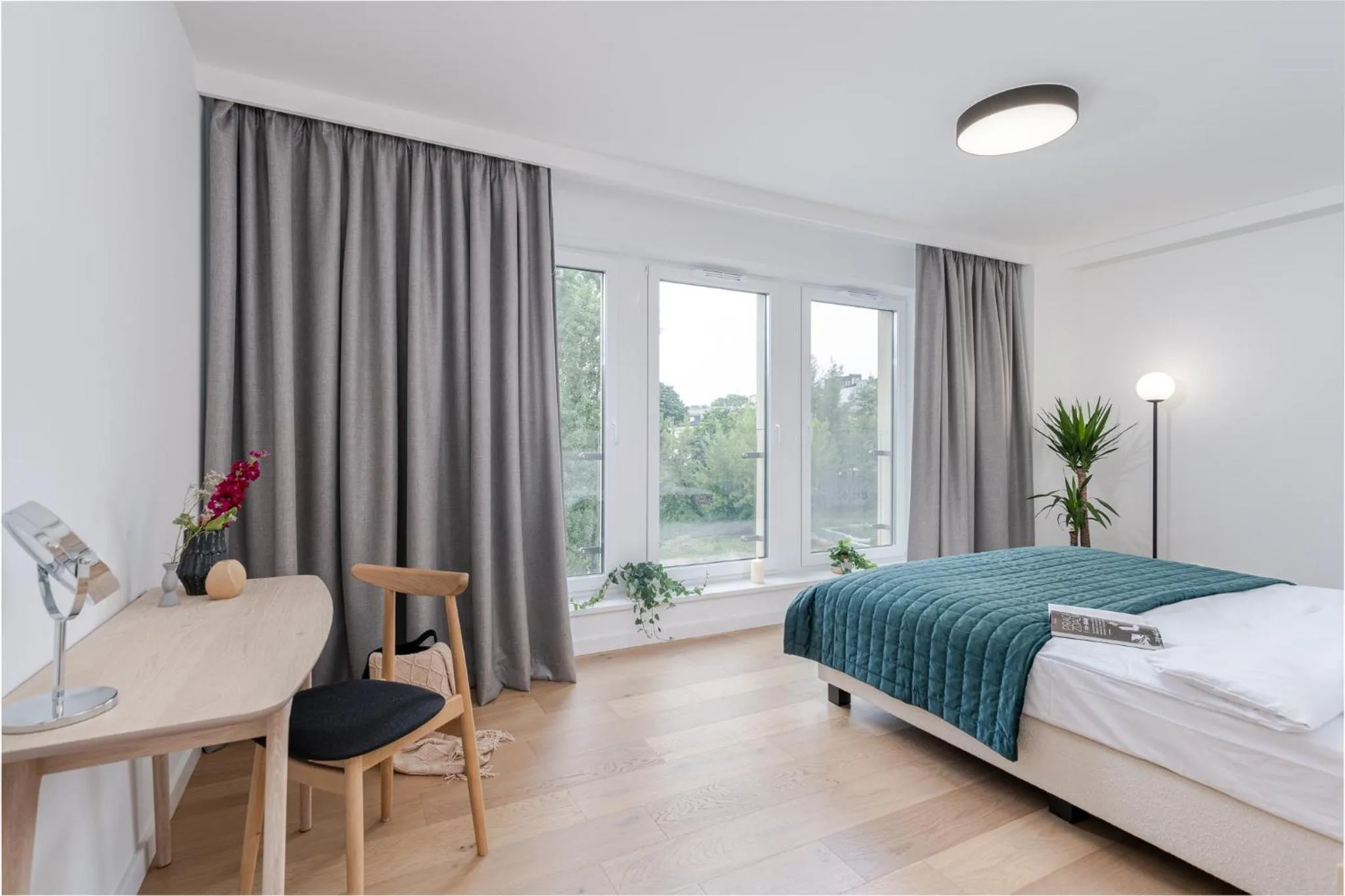 Photo of the whole room in EXCLUSIVE Aparthotel Kraków Lubicz 40