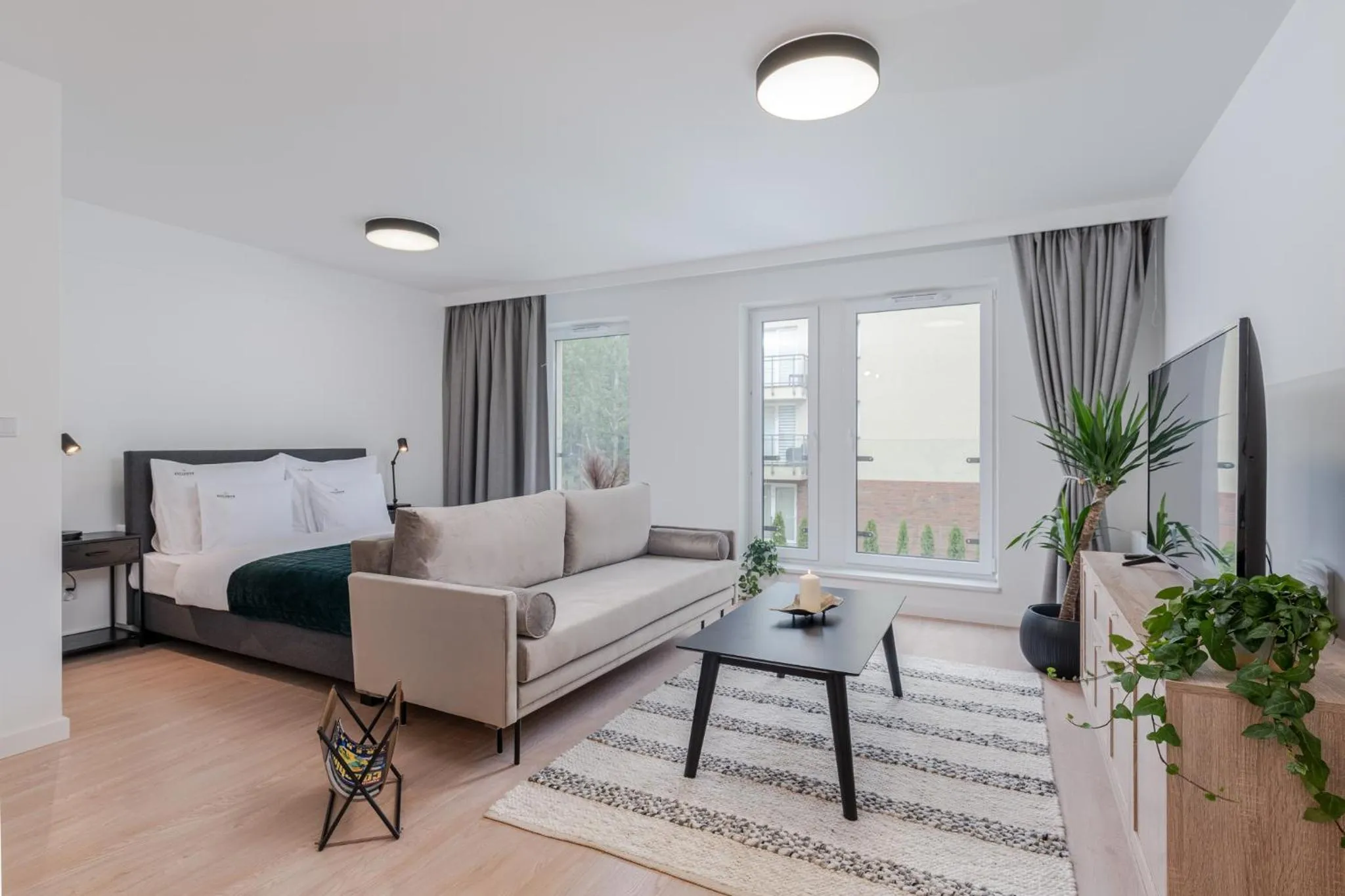 Living room in EXCLUSIVE Aparthotel Kraków Lubicz 40