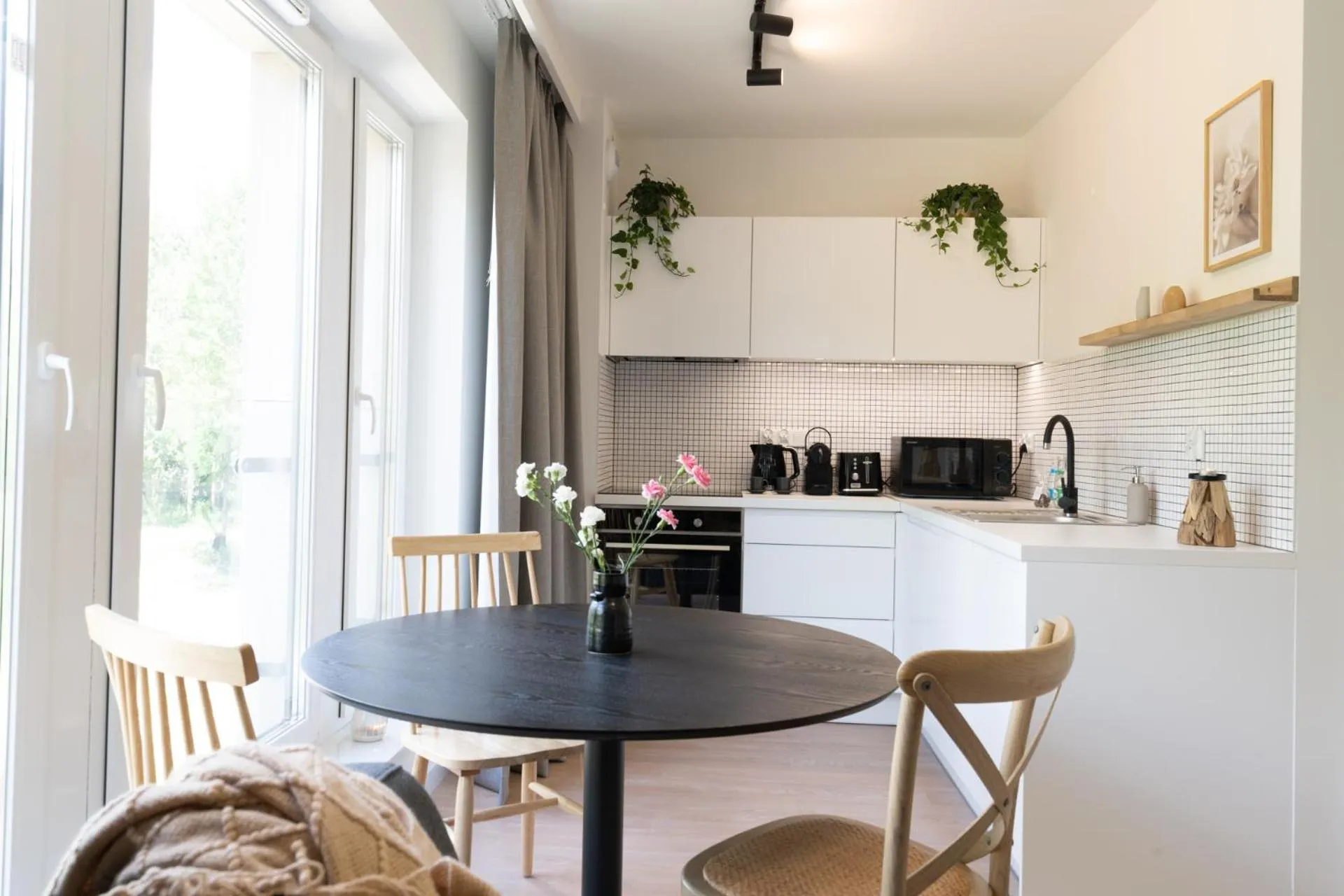 Kitchen or kitchenette in EXCLUSIVE Aparthotel Kraków Lubicz 40