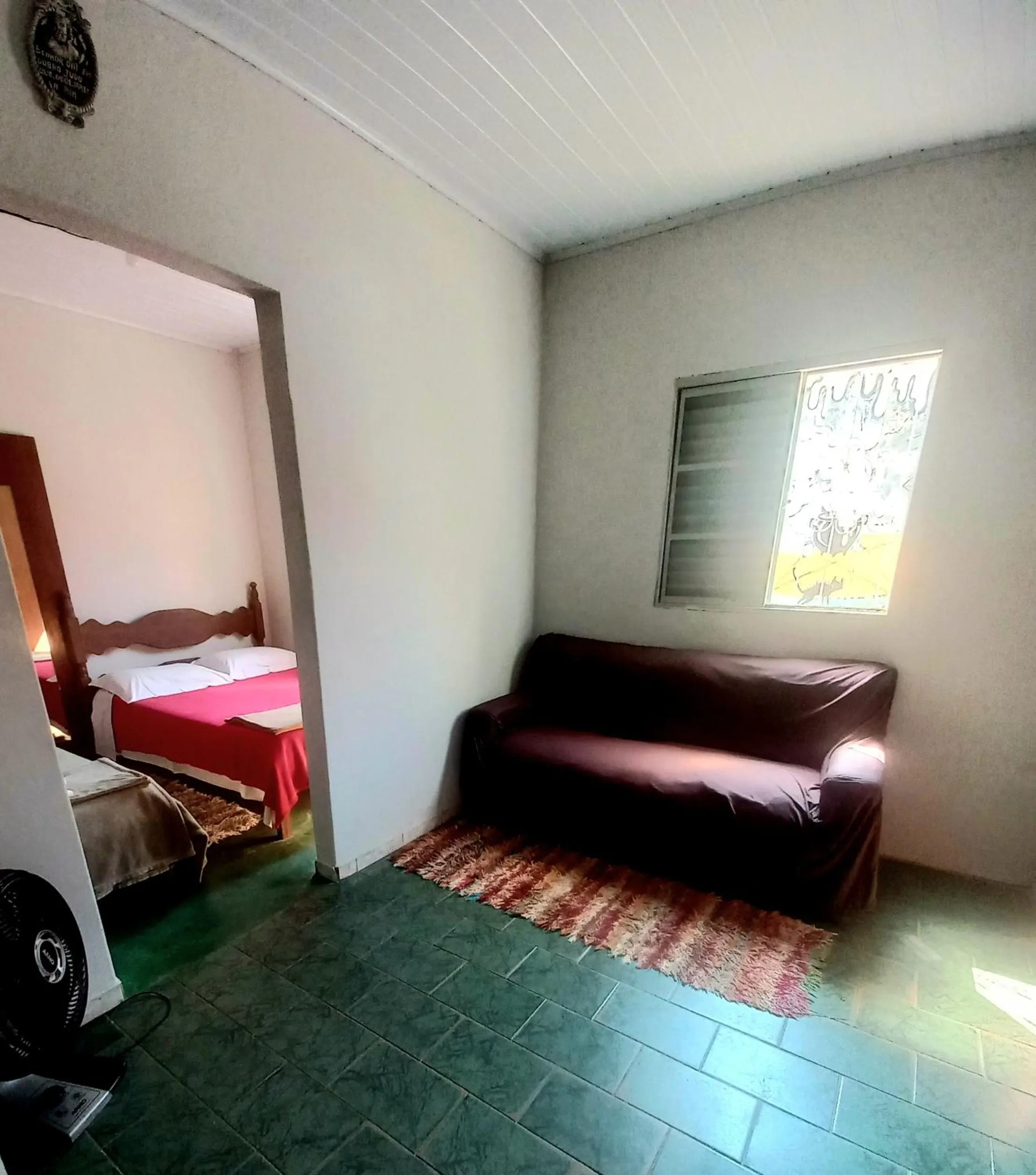 Living room, Bed in Pousada Reino Encantado - São Thomé das Letras - Minas Gerais