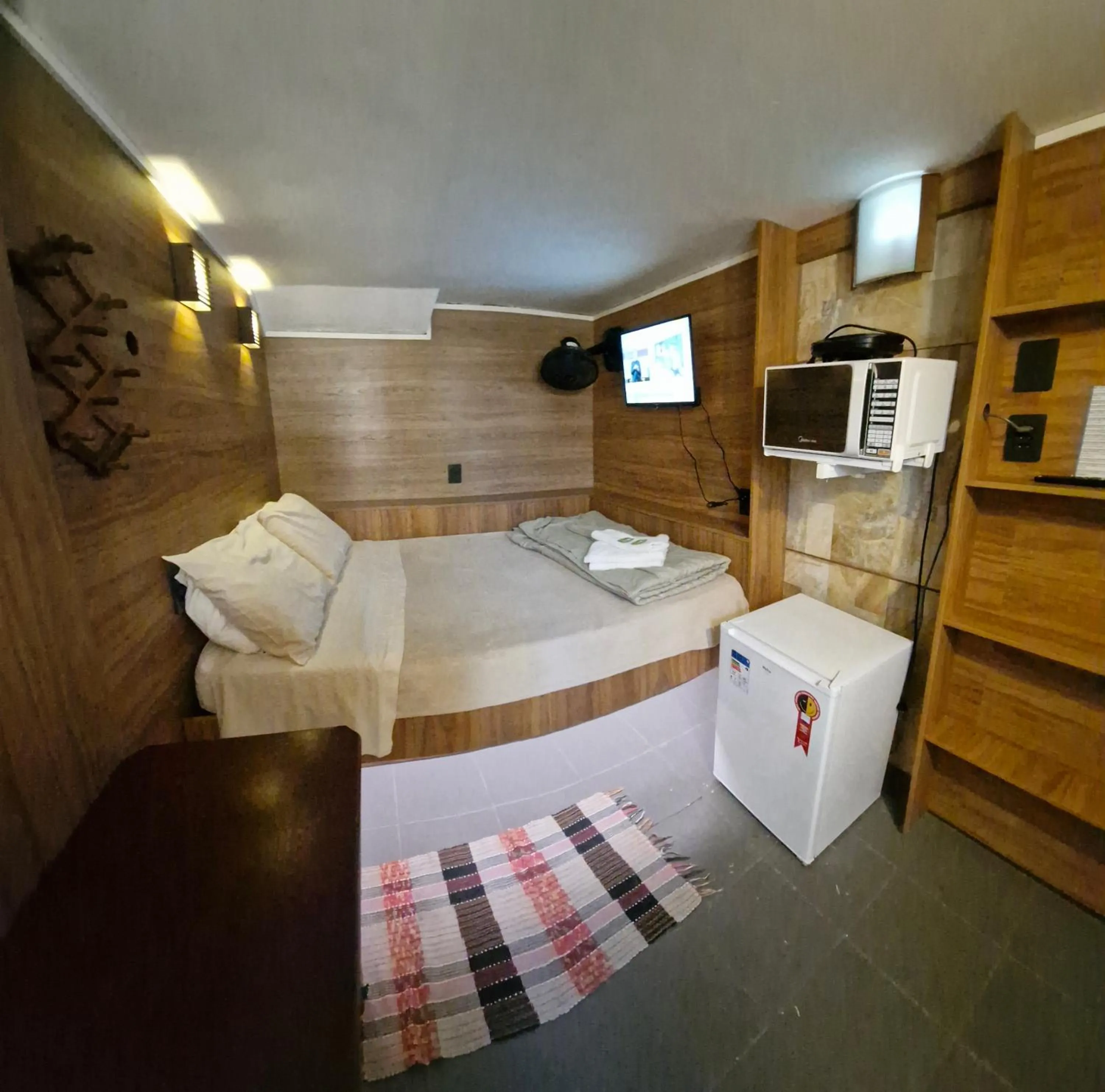 Photo of the whole room in Pousada Reino Encantado - São Thomé das Letras - Minas Gerais