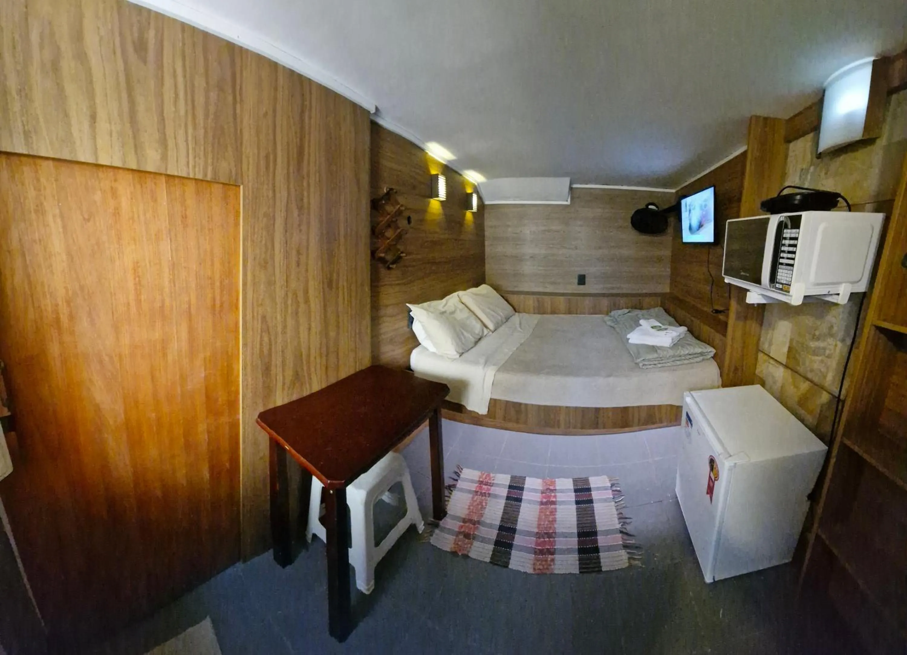 Photo of the whole room, Bed in Pousada Reino Encantado - São Thomé das Letras - Minas Gerais