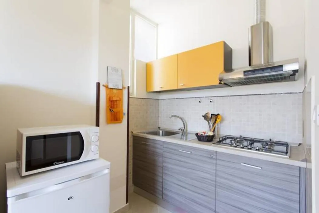 Kitchen or kitchenette in Casa Cavour