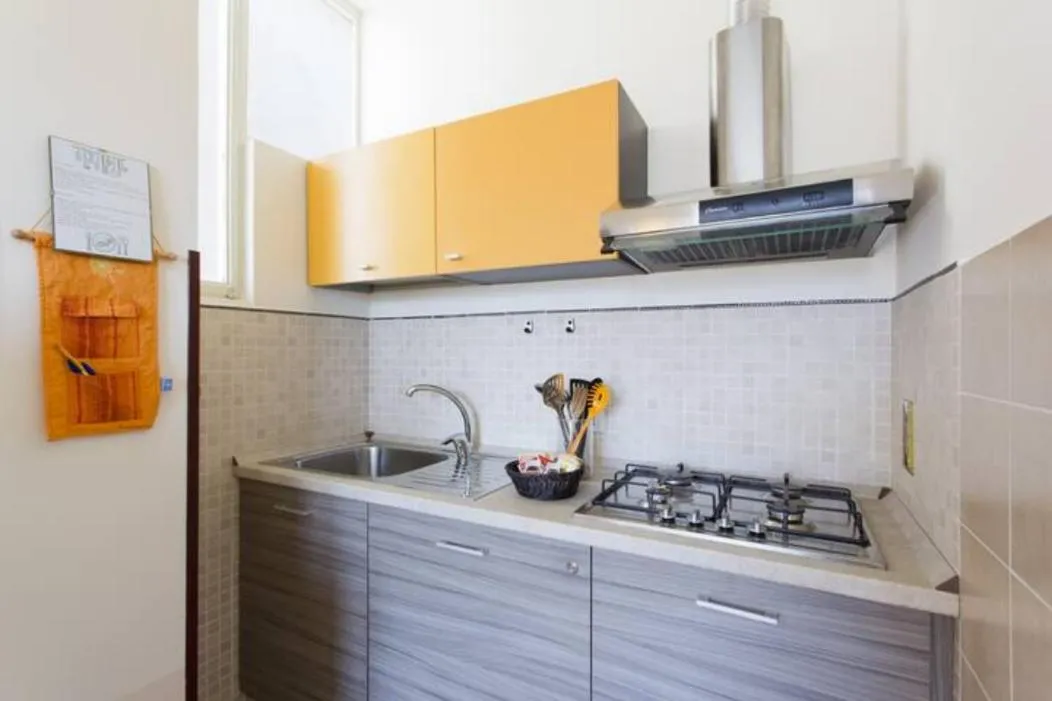 Kitchen or kitchenette in Casa Cavour