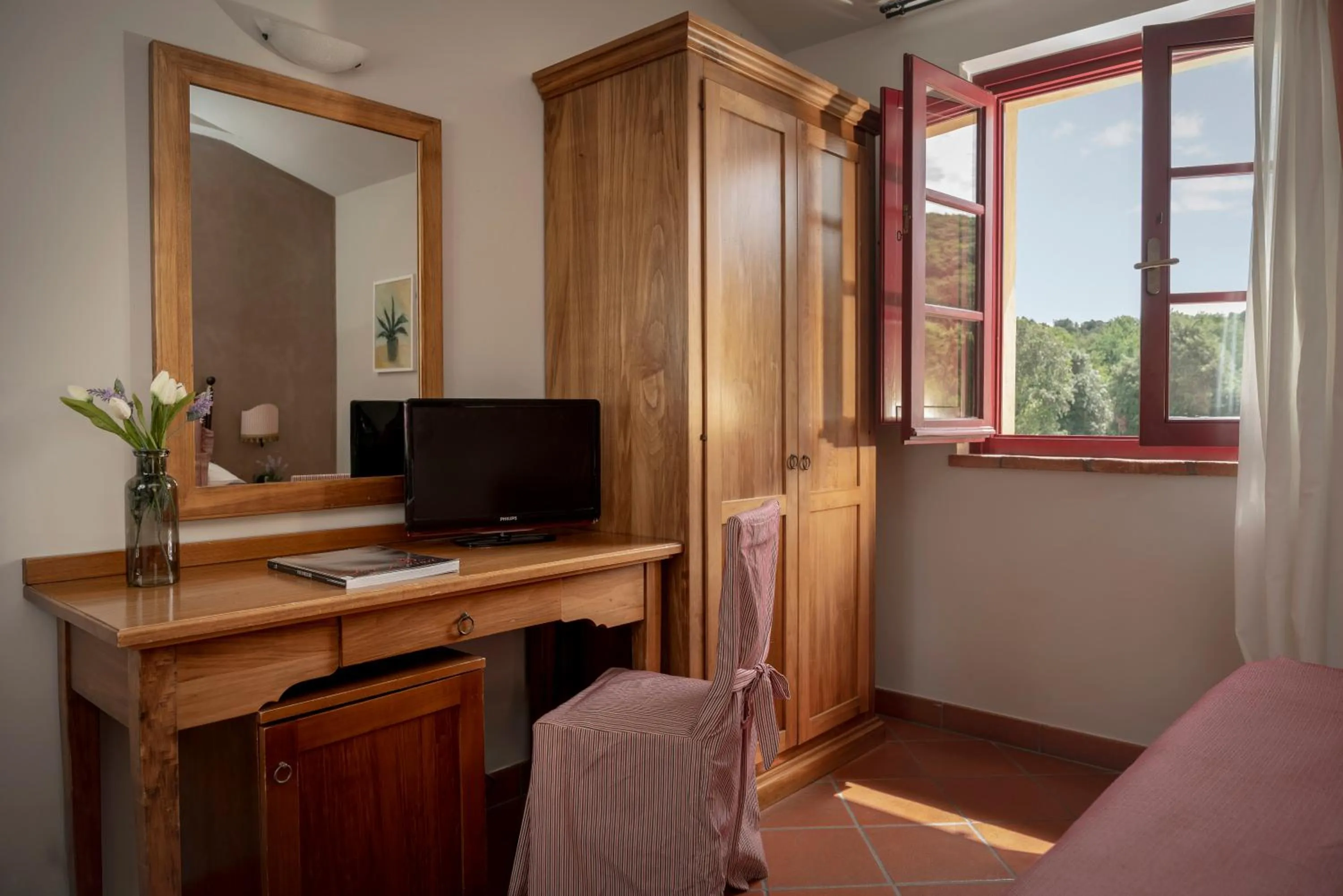 Photo of the whole room in Hotel & Restaurant Casolare Le Terre Rosse