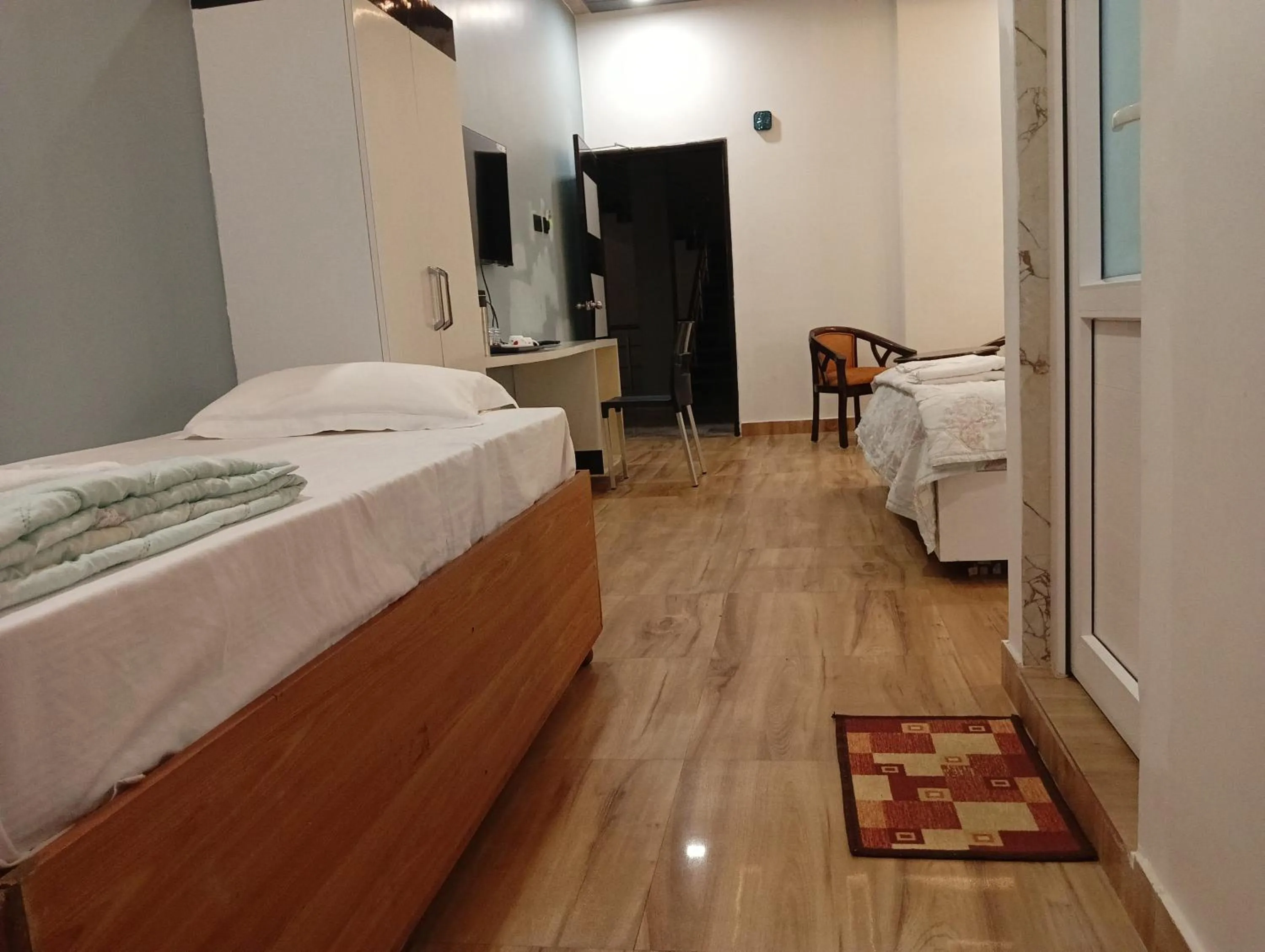 Photo of the whole room, Bed in Hotel Buddha Park near Sarnath, Varanasi