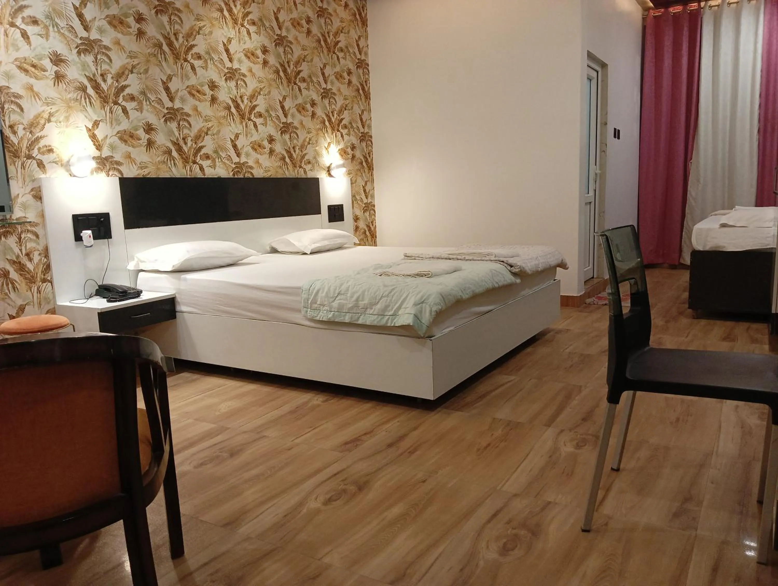 Photo of the whole room, Bed in Hotel Buddha Park near Sarnath, Varanasi