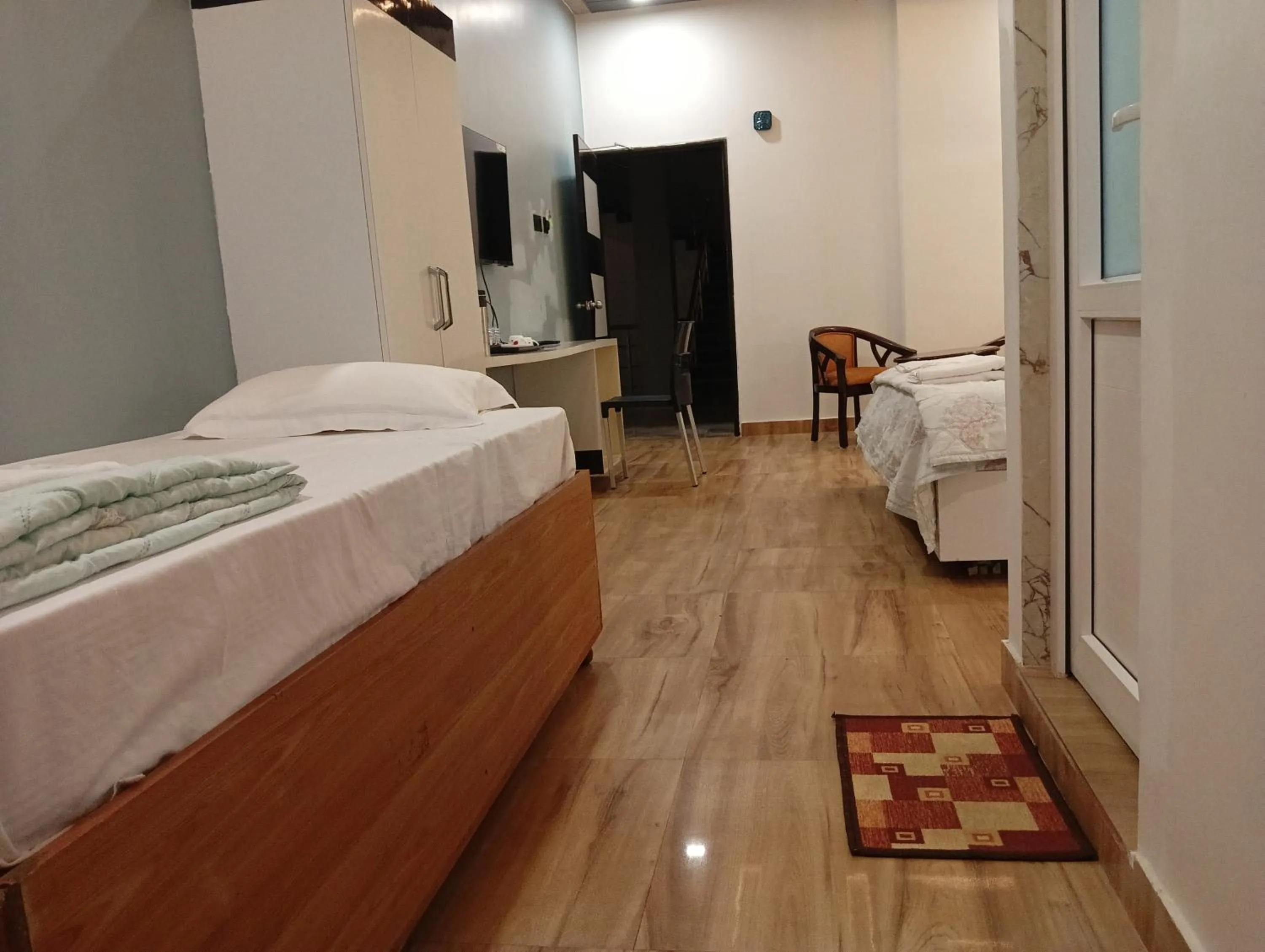 Photo of the whole room, Bed in Hotel Buddha Park near Sarnath, Varanasi