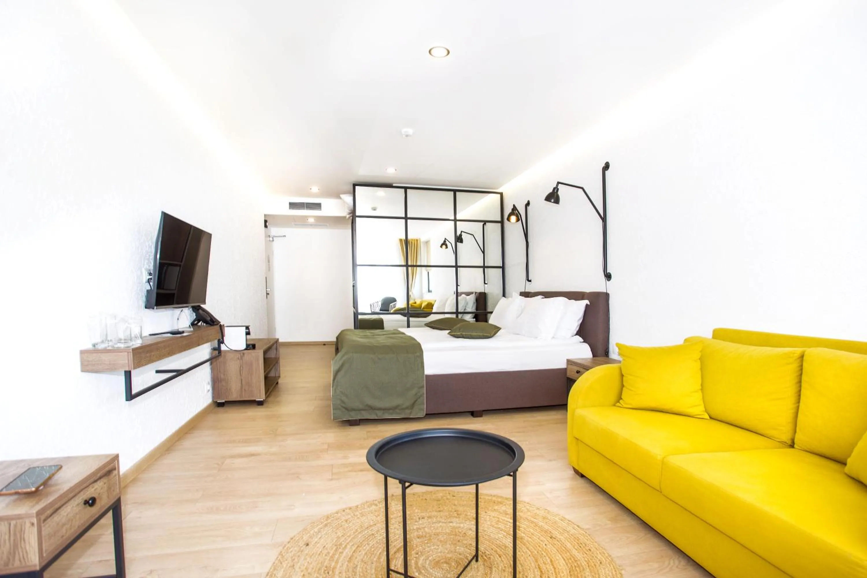 Communal lounge/ TV room in Olive Villas Beach Hotel