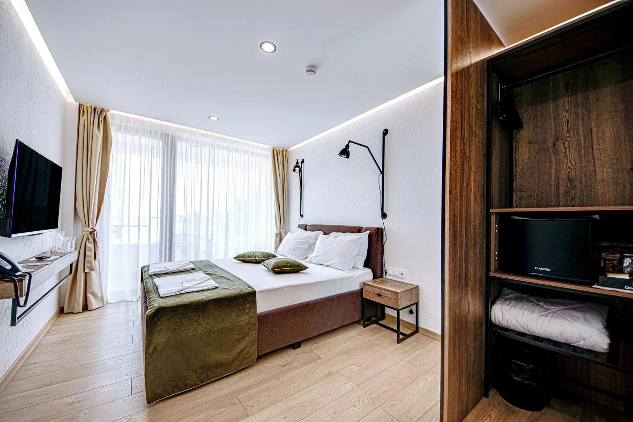 Bed in Olive Villas Beach Hotel