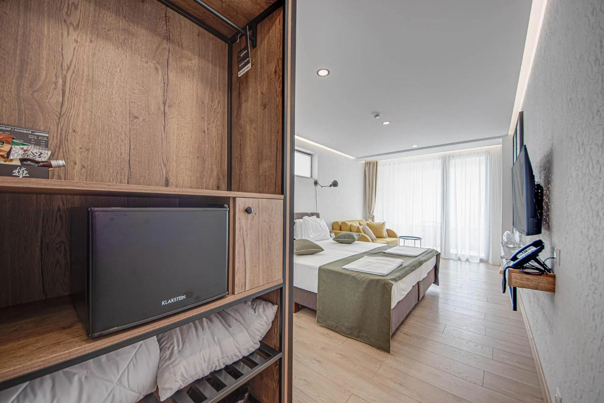 Communal lounge/ TV room, Bed in Olive Villas Beach Hotel