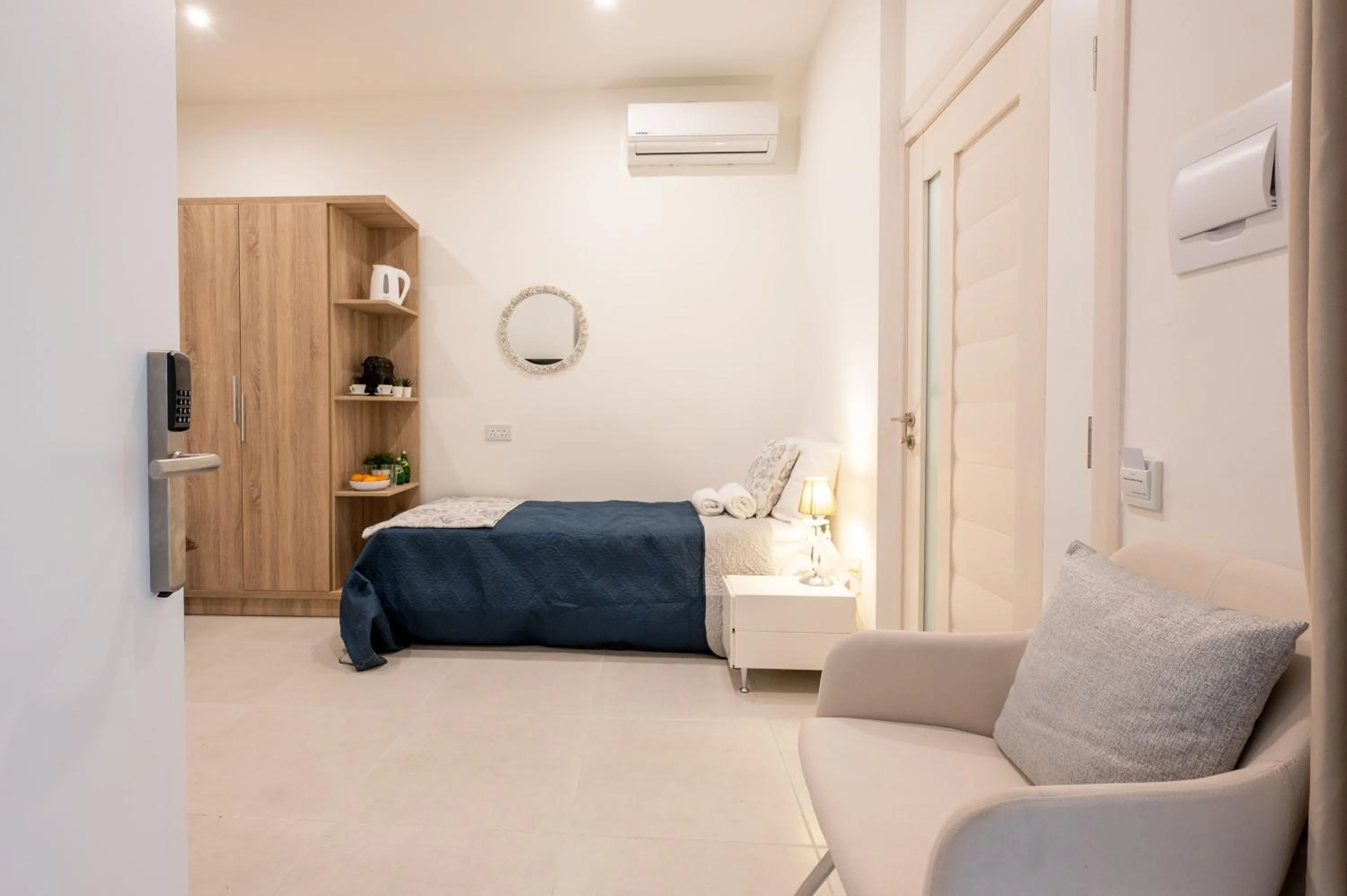 Bed in Vela Blu Boutique Suites