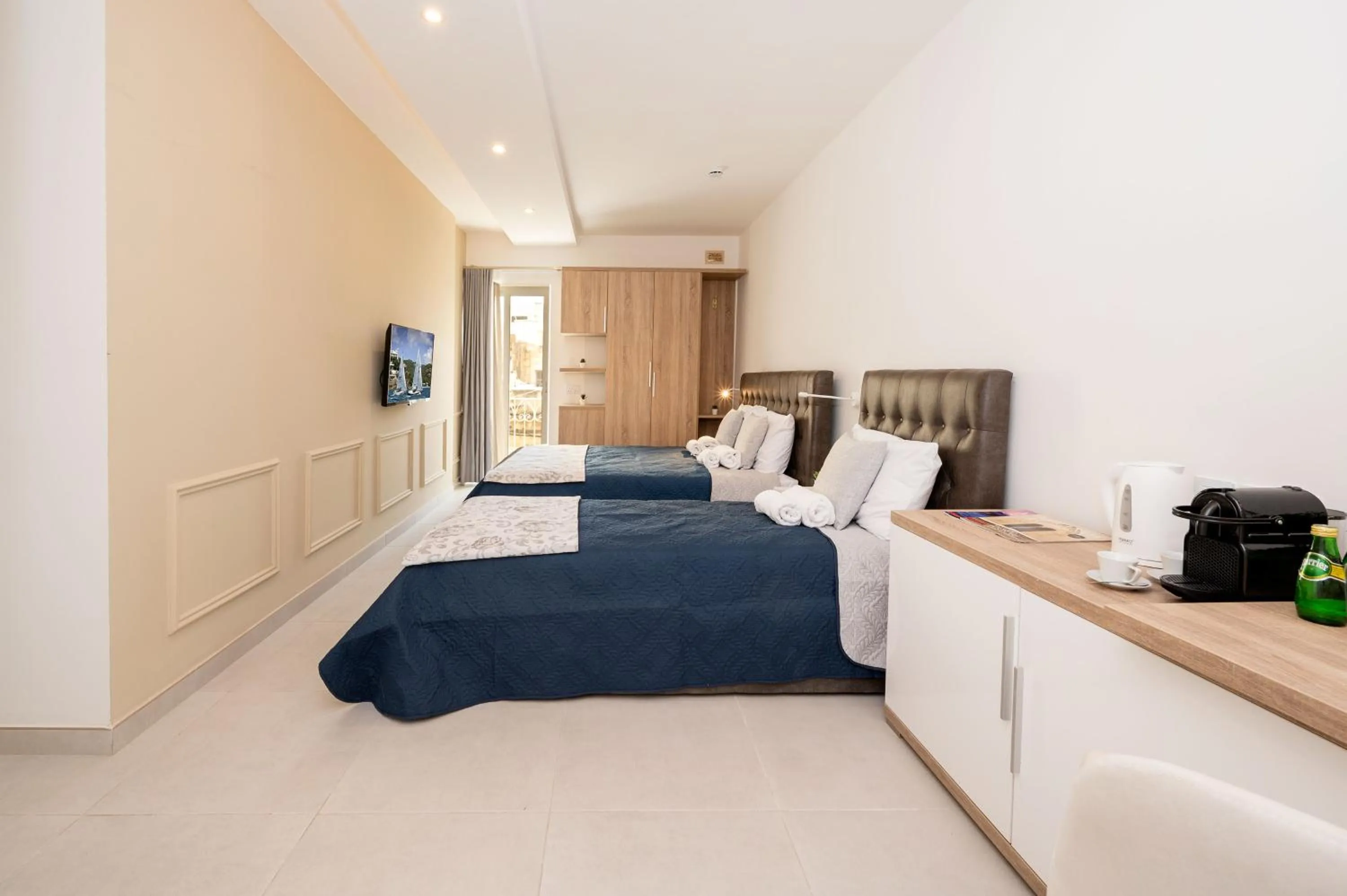 Photo of the whole room, Bed in Vela Blu Boutique Suites