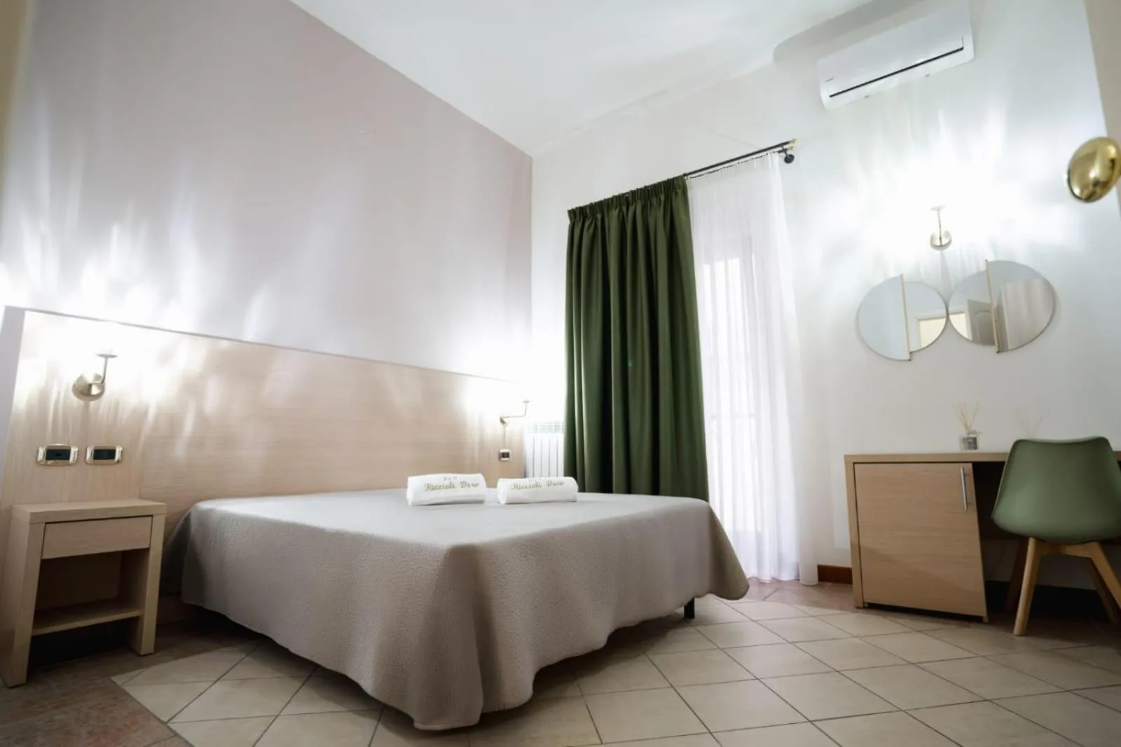 Bed in B&B Riccioli D'oro