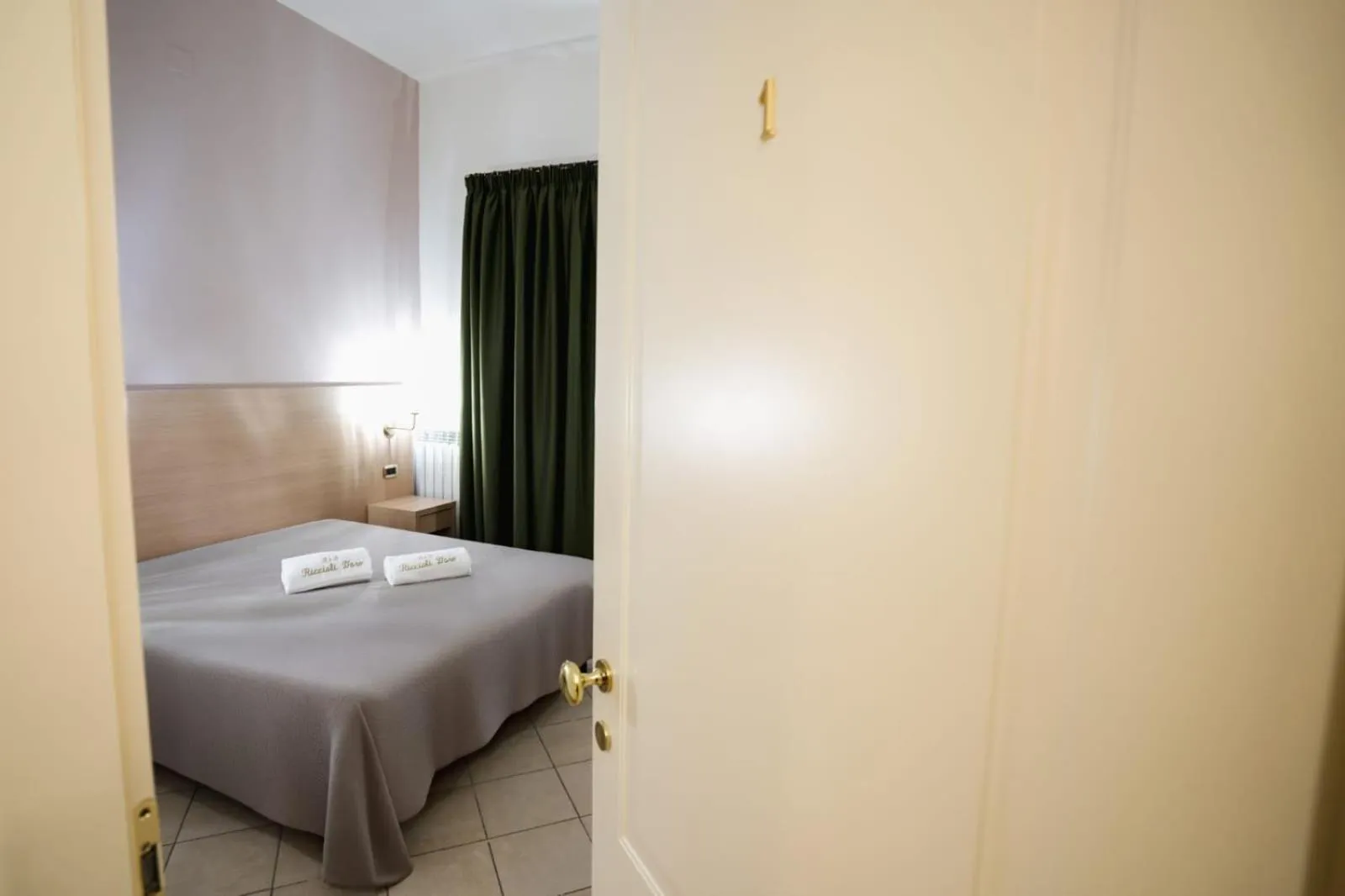 Bed in B&B Riccioli D'oro