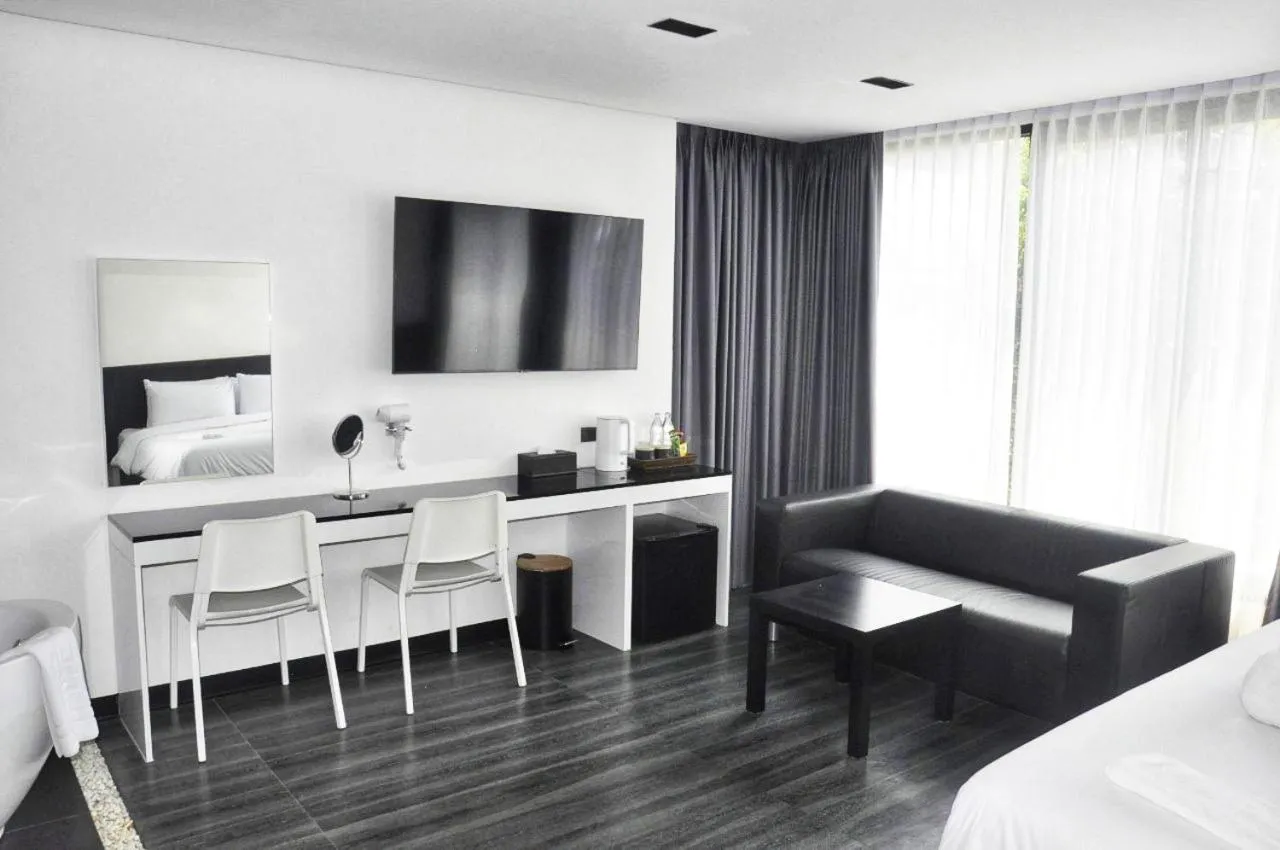 Photo of the whole room, Bed in NANEE Phra Singh