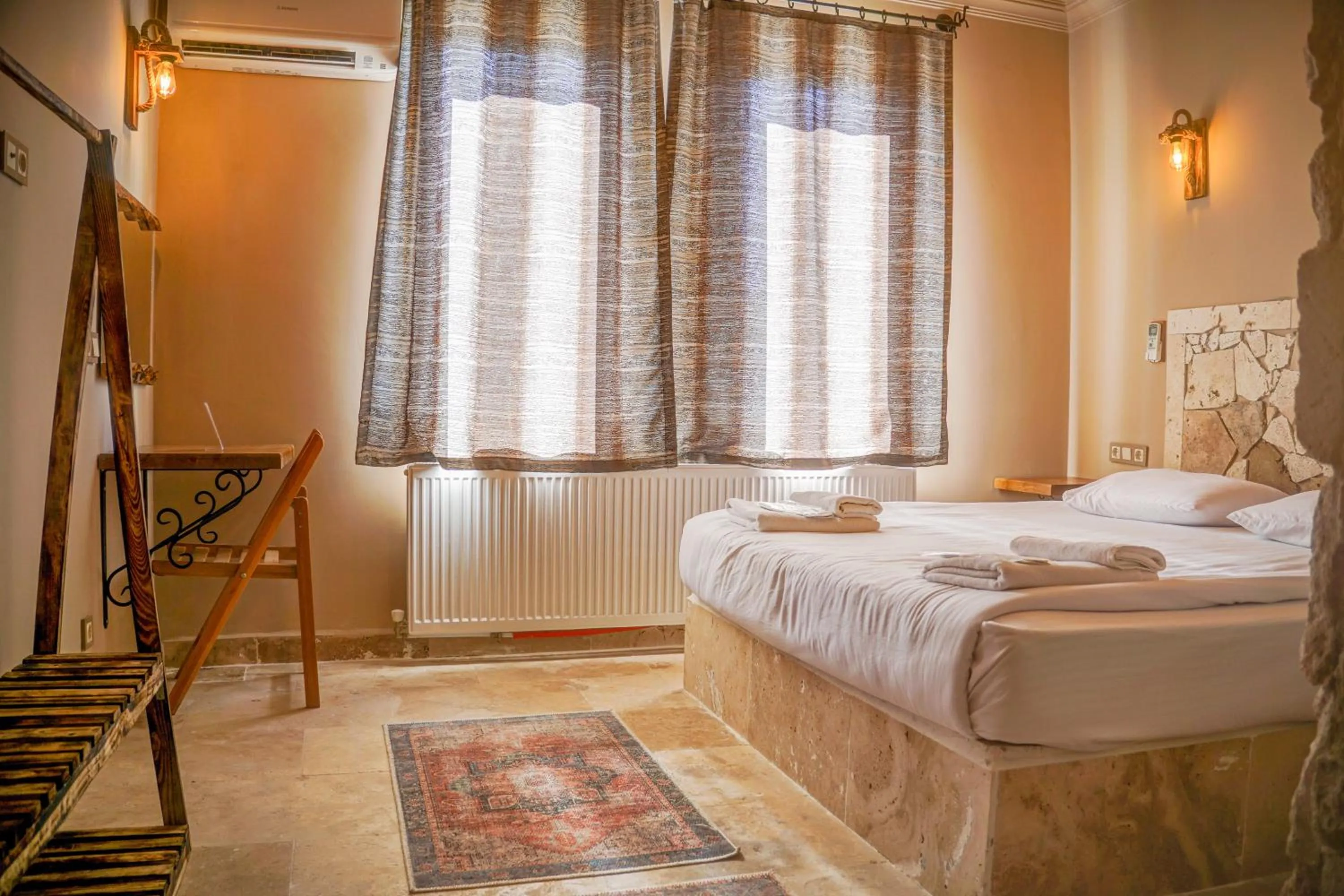 Bed in Ala Stone House