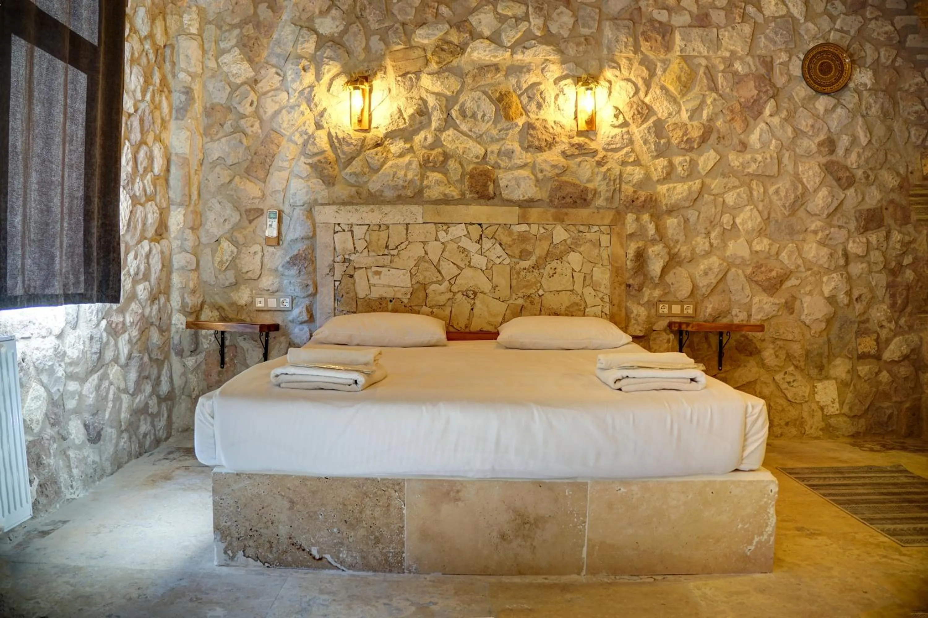 Bed in Ala Stone House