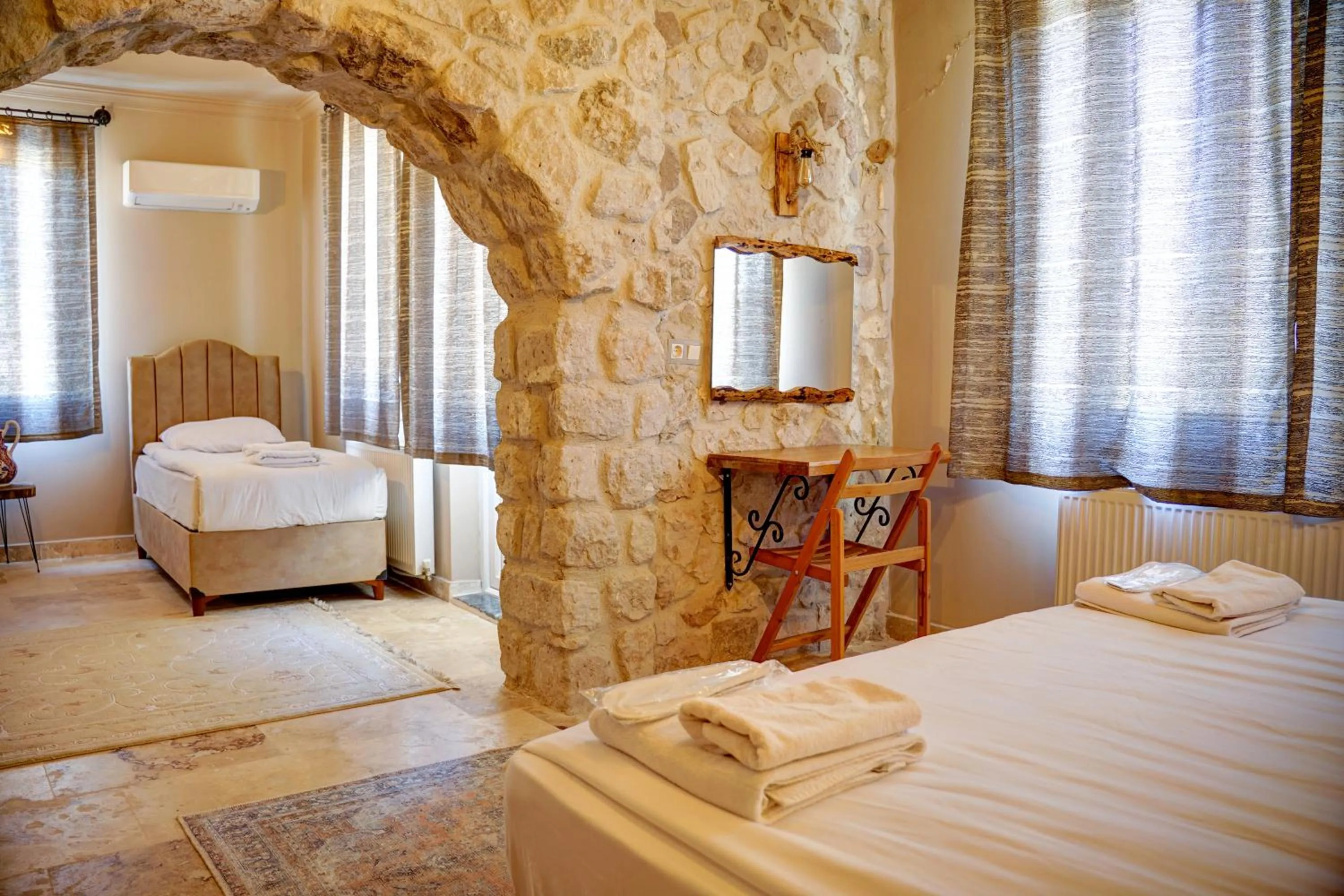 Bed in Ala Stone House