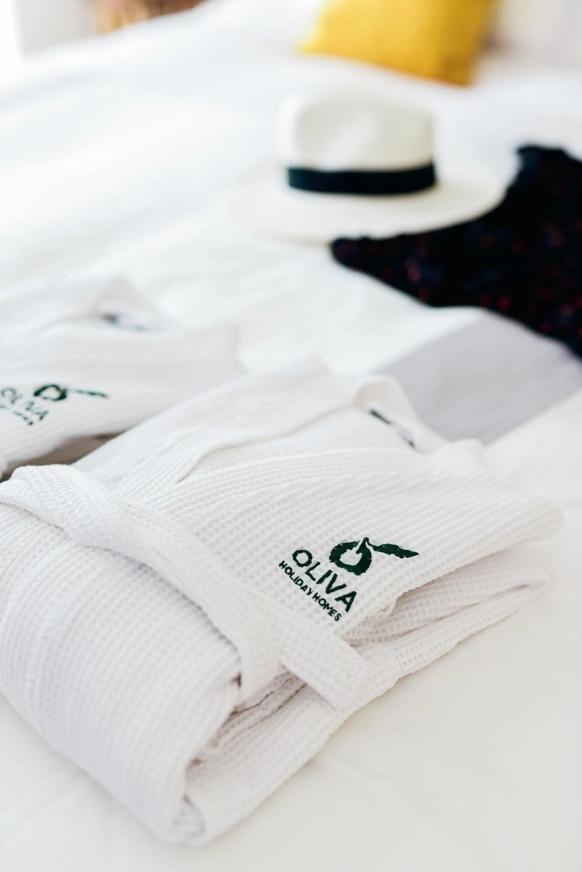 towels, Bed in Oliva Holiday Homes