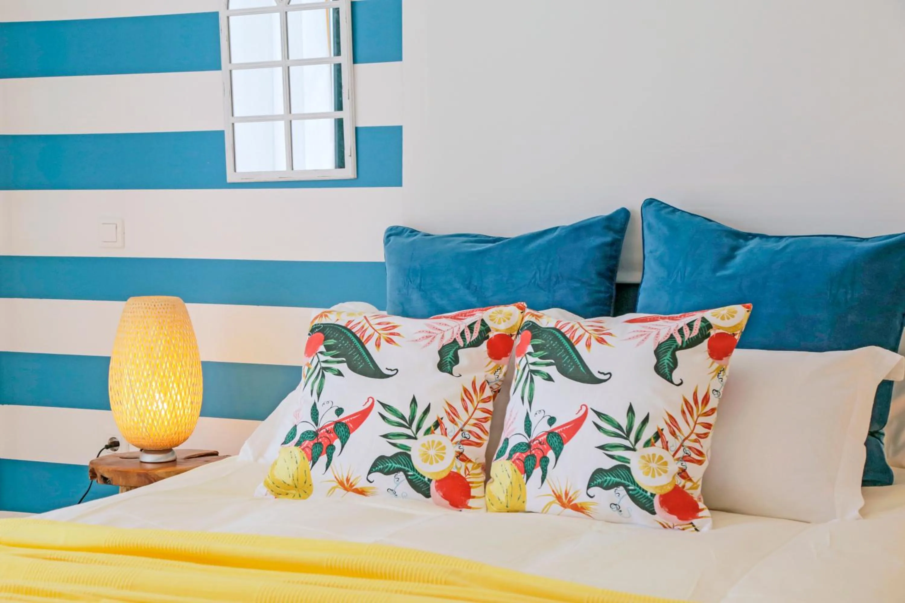 Bed in Oliva Holiday Homes